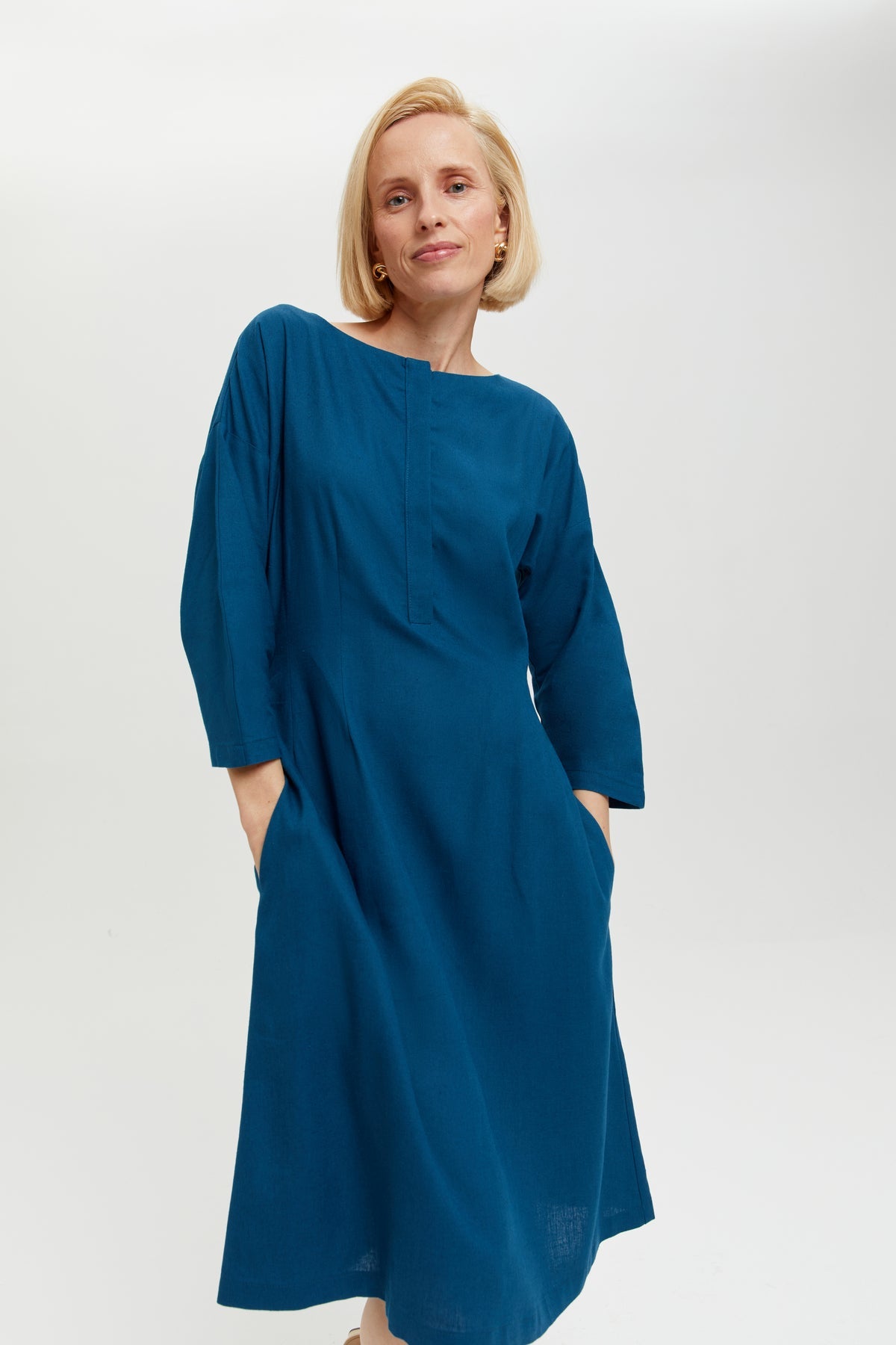 Lusin | Midi linen dress with button placket in petrol blue by Ayani