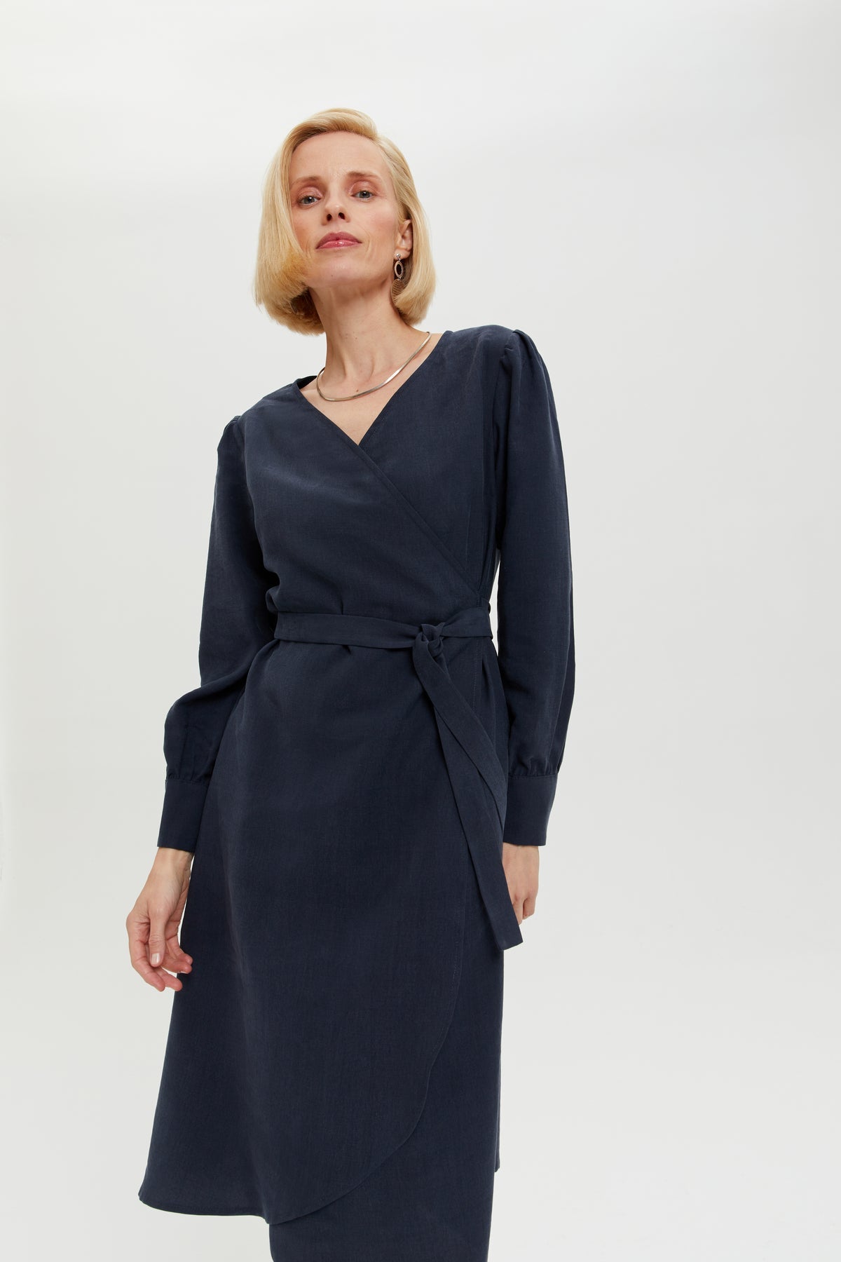 Sophie | Elegant wrap dress with puff sleeves and tie belt in forest green by Ayani