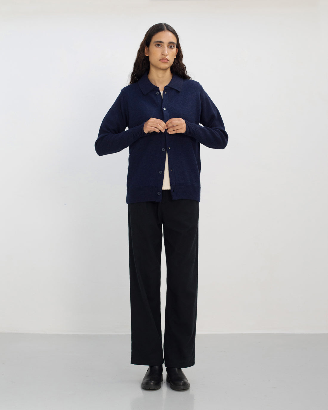 Blue cardigan made of 100% merino wool by Rotholz