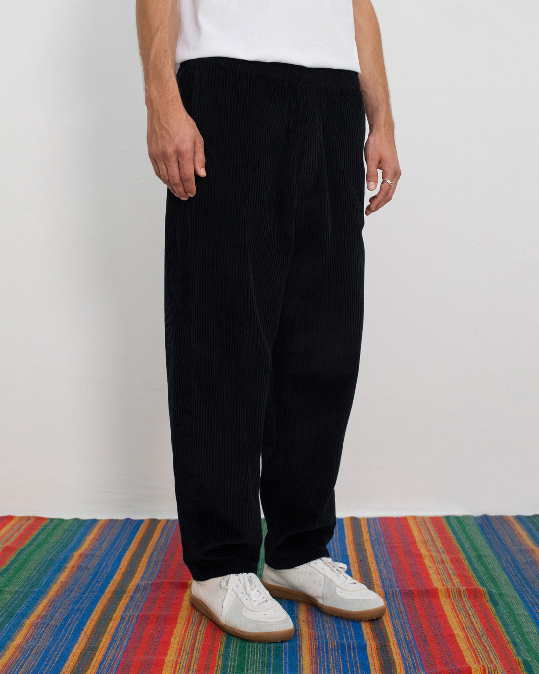 Black wide corduroy trousers made from 100% organic cotton by Rotholz