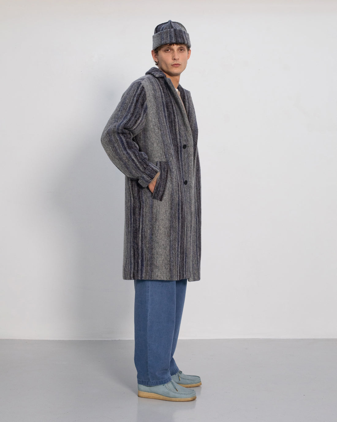 Grey striped coat made of organic wool by Rotholz