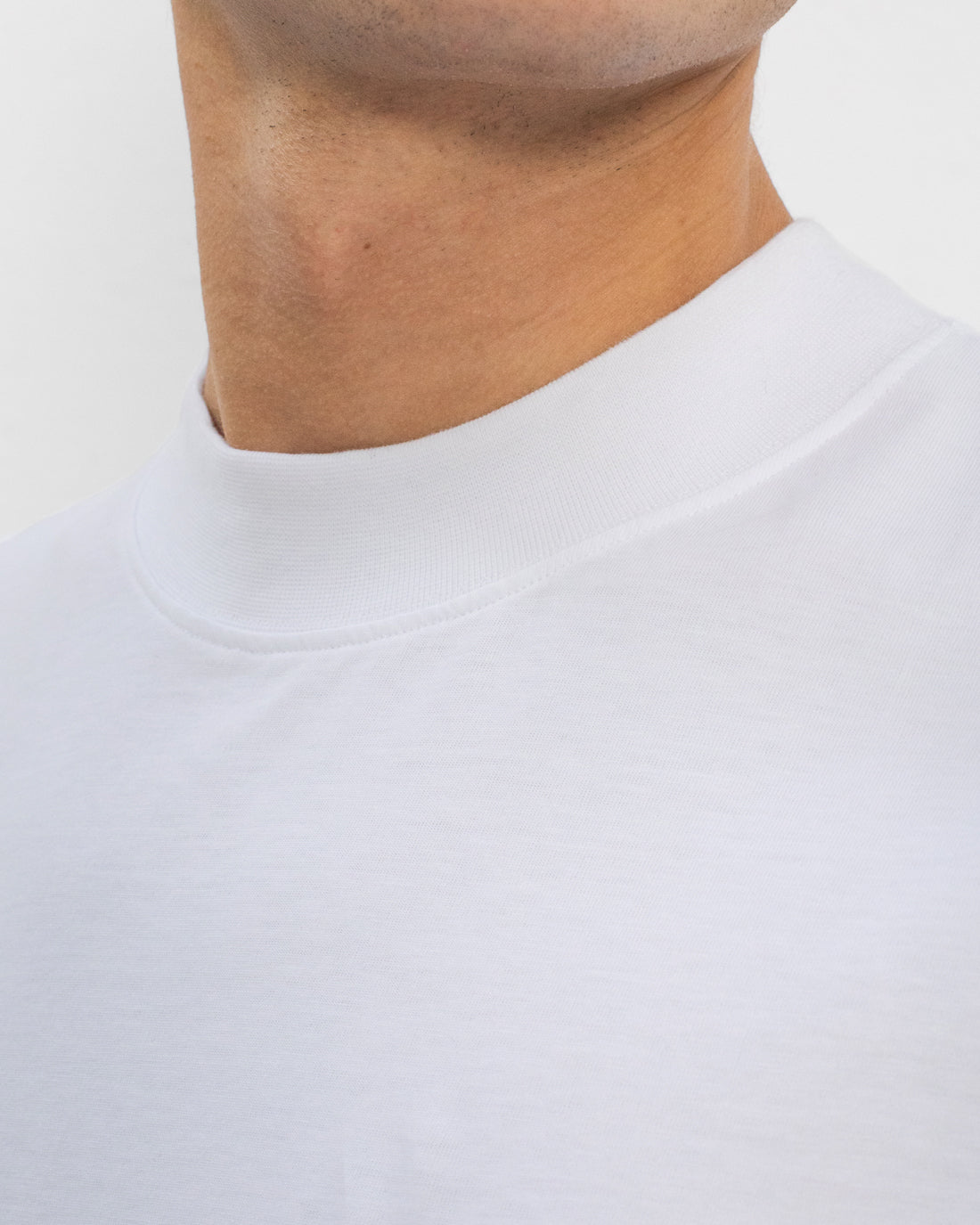 White basic T-shirt with wide collar made of 100% organic cotton by Rotholz