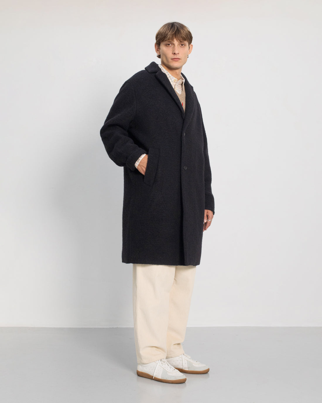 Black organic wool coat from Rotholz