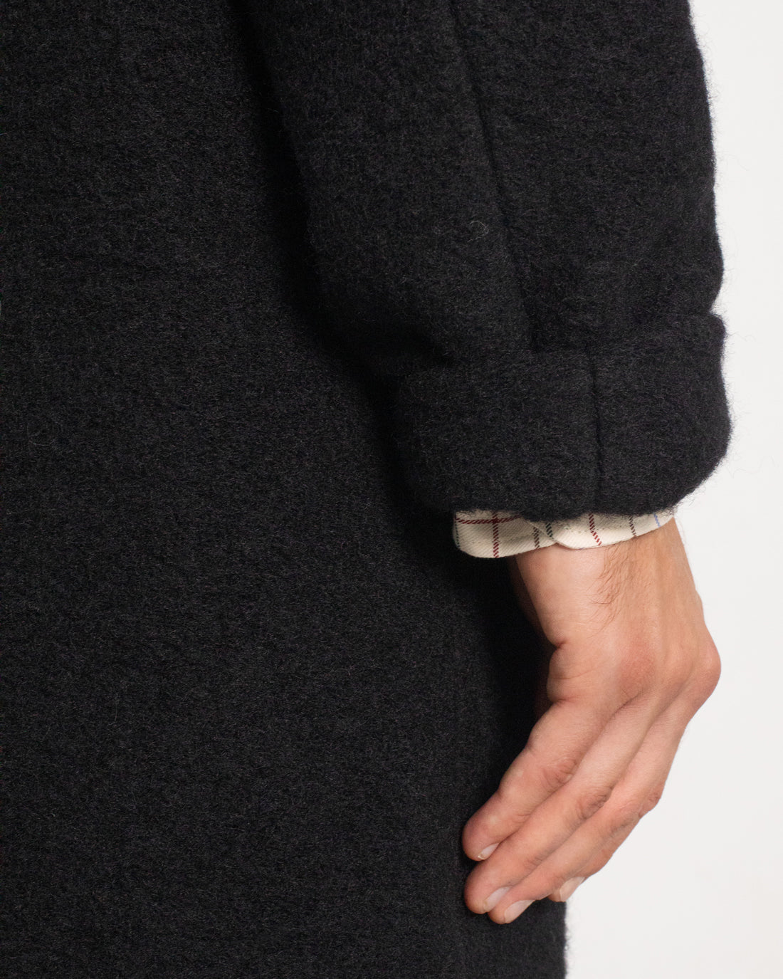 Black organic wool coat from Rotholz