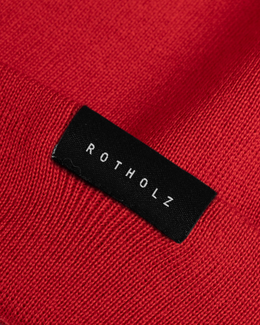 Red classic hat made of 100% organic merino wool by Rotholz