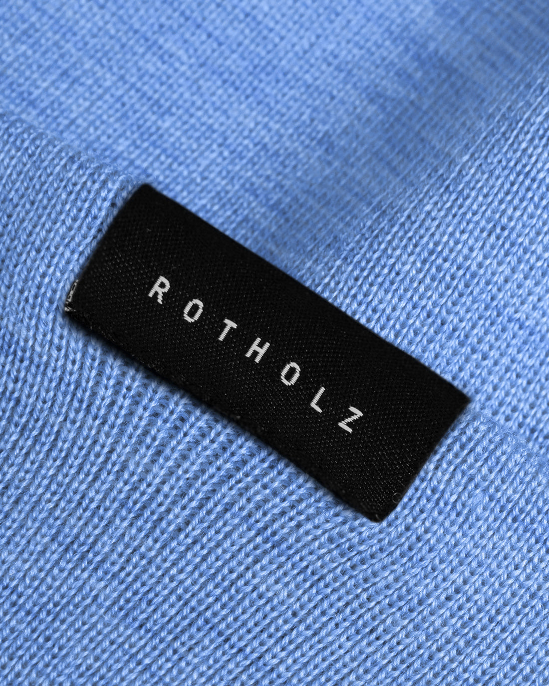 Light blue short hat made of merino wool by Rotholz