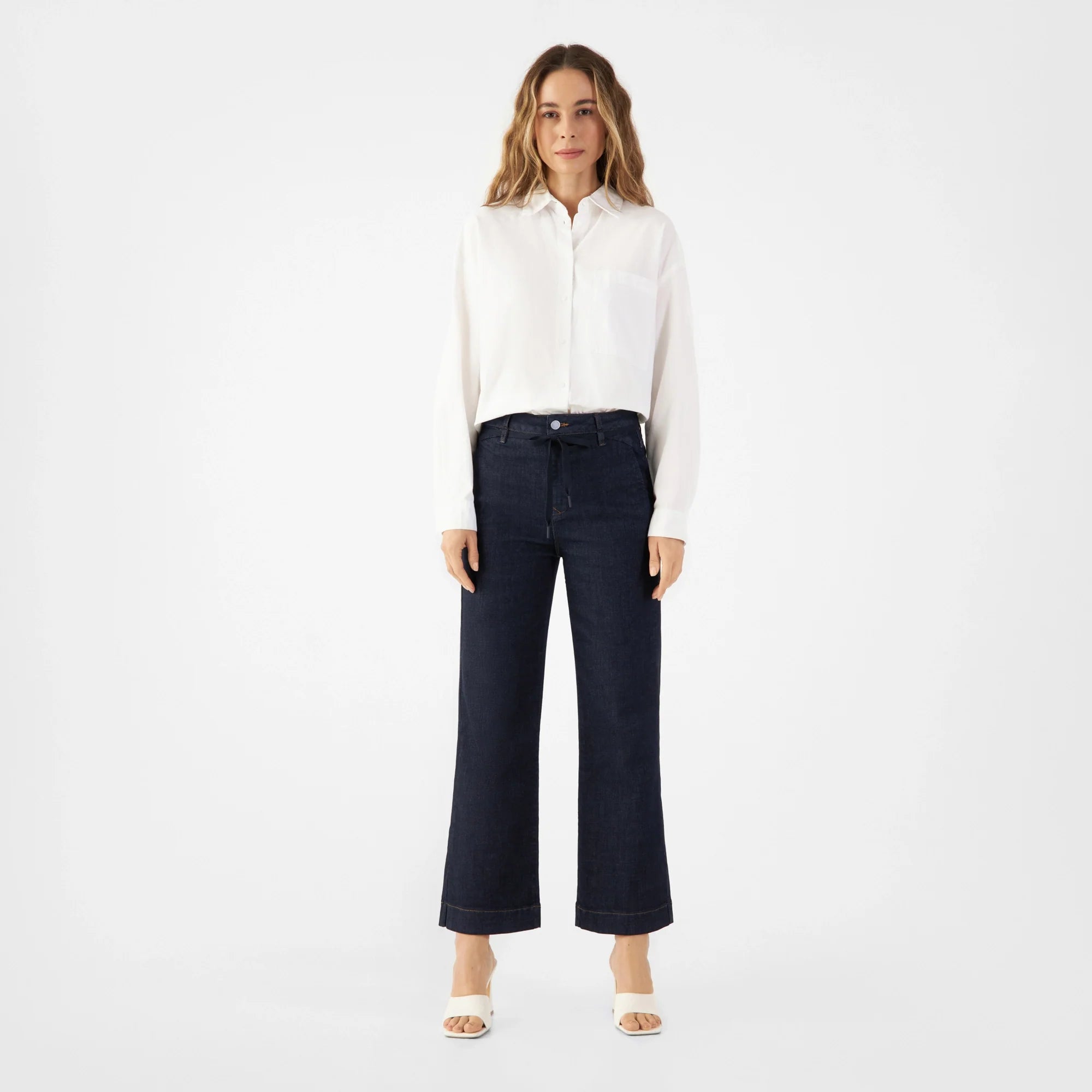 Dark blue DEW Flared Cropped jeans made from organic cotton by Dawn Denim 