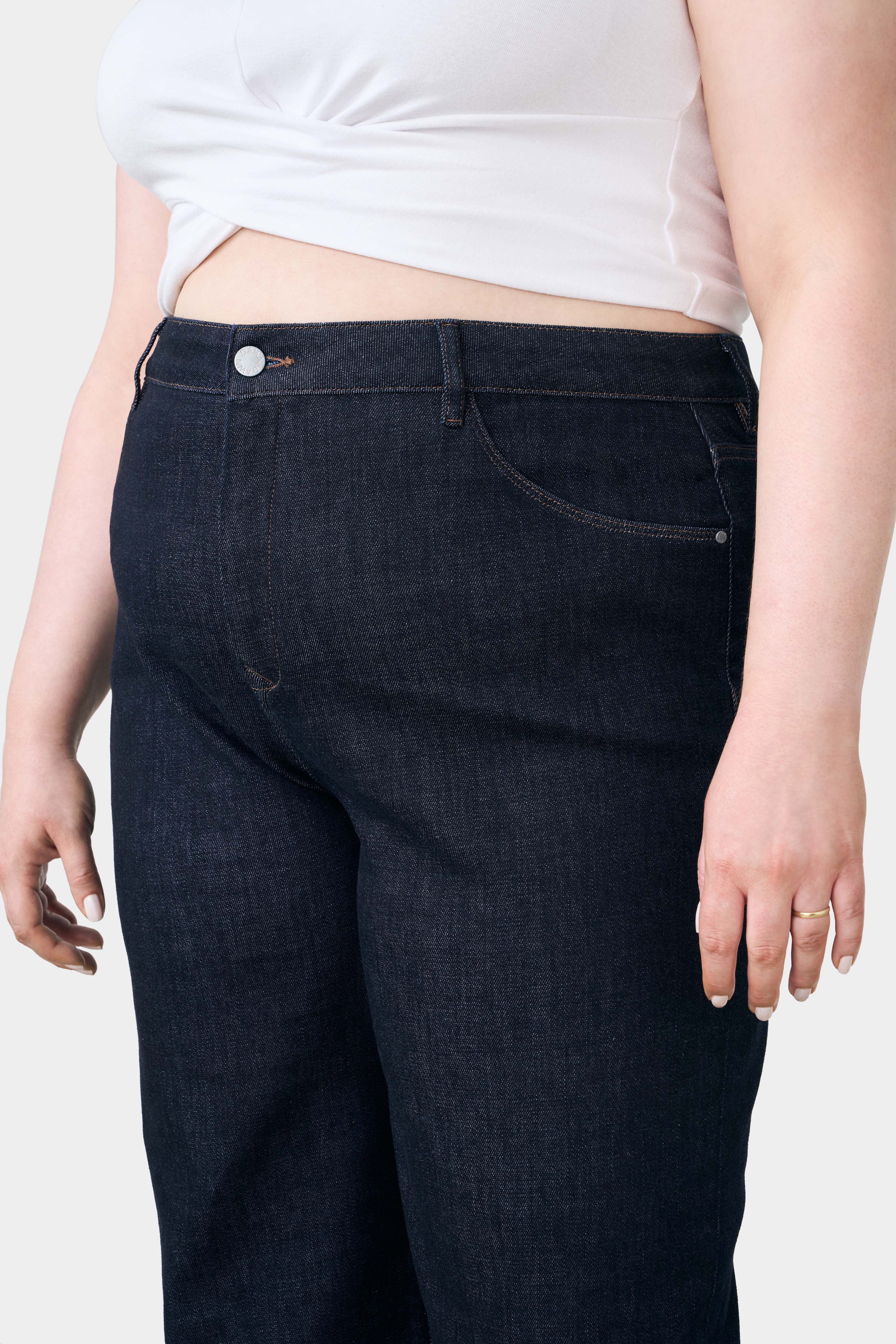 Dark blue DEW Flared Classic Curvy jeans made from organic cotton by Dawn Denim