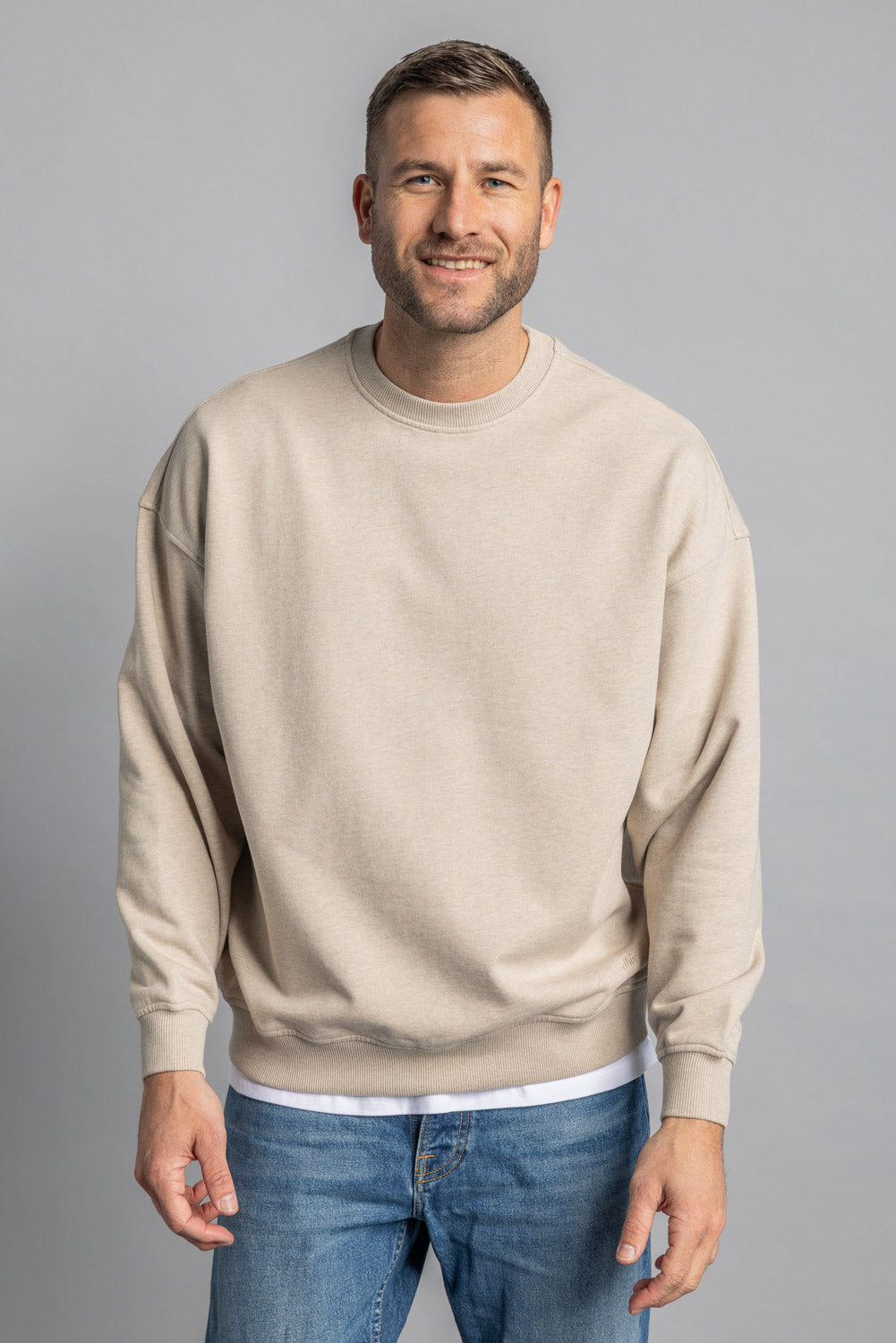 Beige oversized sweater made from 100% organic cotton by Dirts