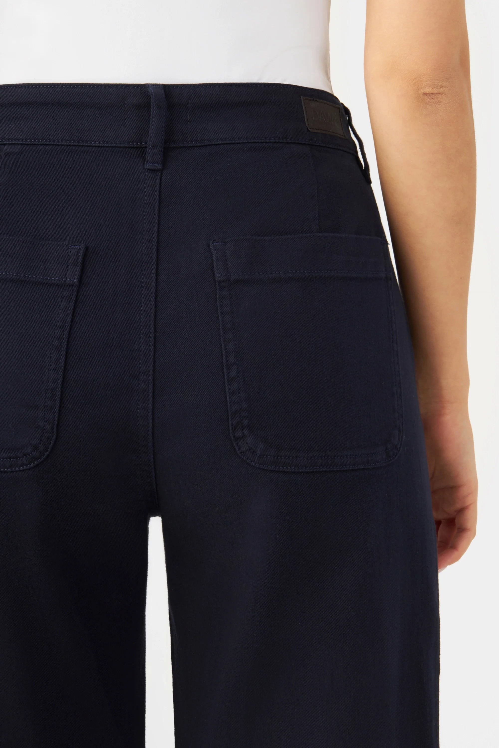 Dark blue DEW Flared jeans made from organic cotton by Dawn Denim