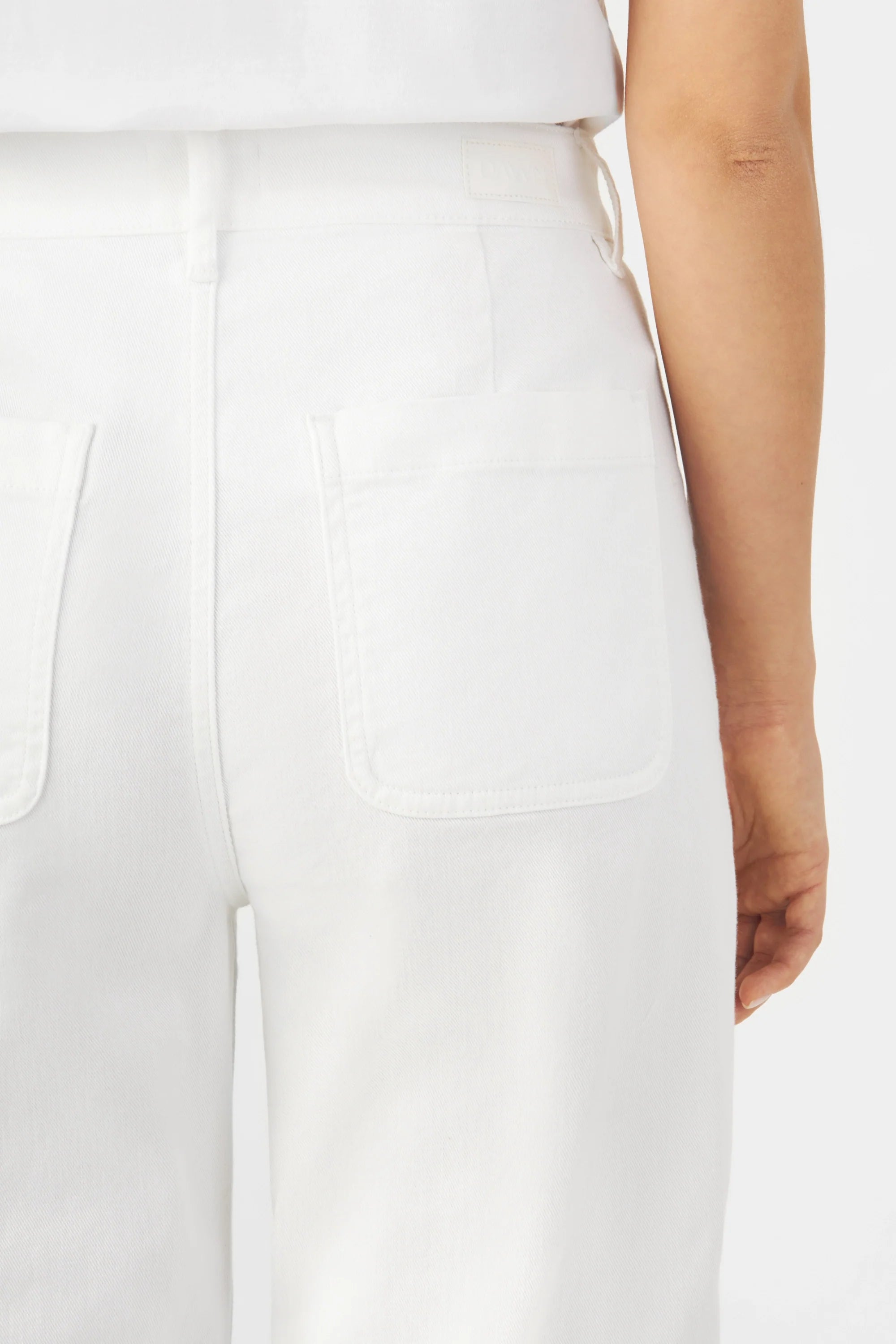 White DEW Flared jeans made from organic cotton by Dawn Denim