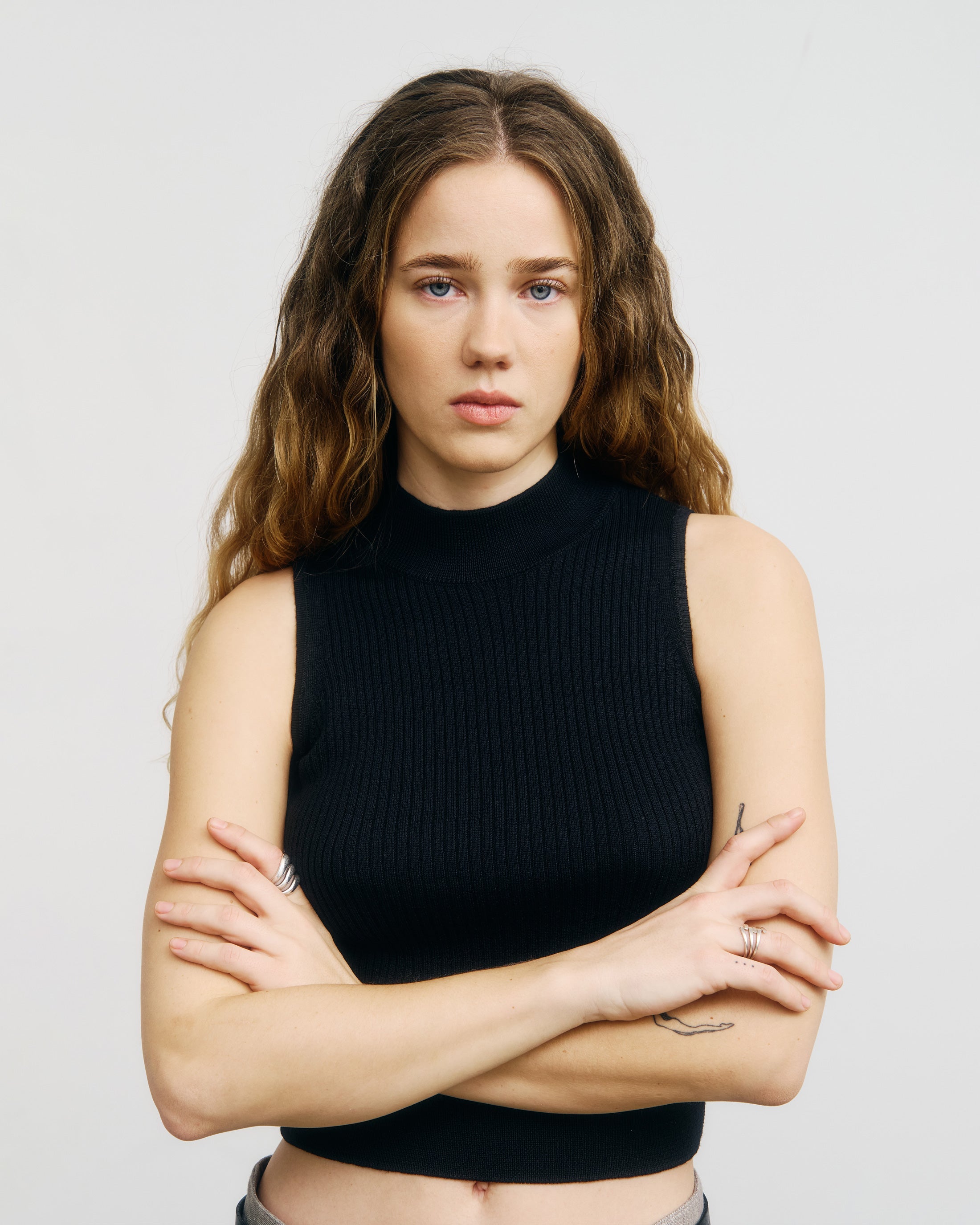 Black Knitted Singlet Top Made of 100% Merino Wool by Rotholz