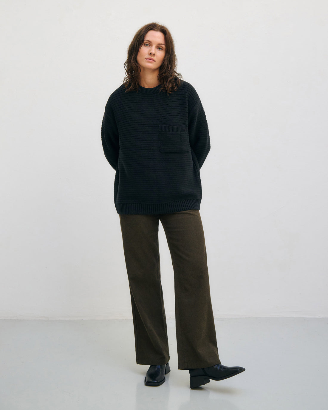 Black ribbed knit sweater made from 100% organic cotton by Rotholz