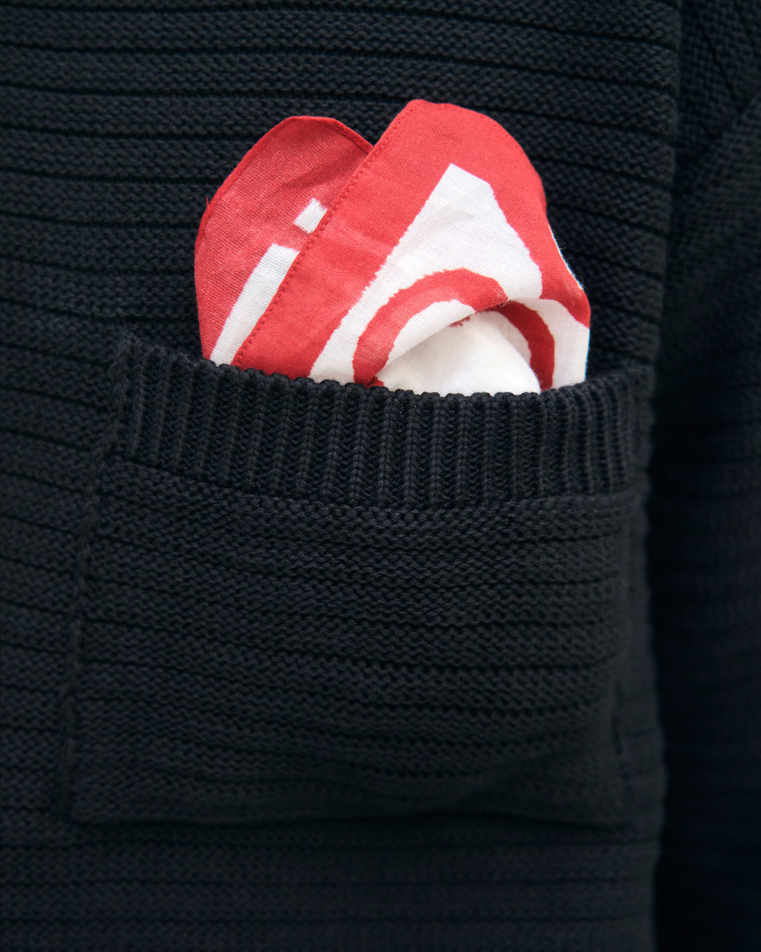 Black ribbed knit sweater made from 100% organic cotton by Rotholz