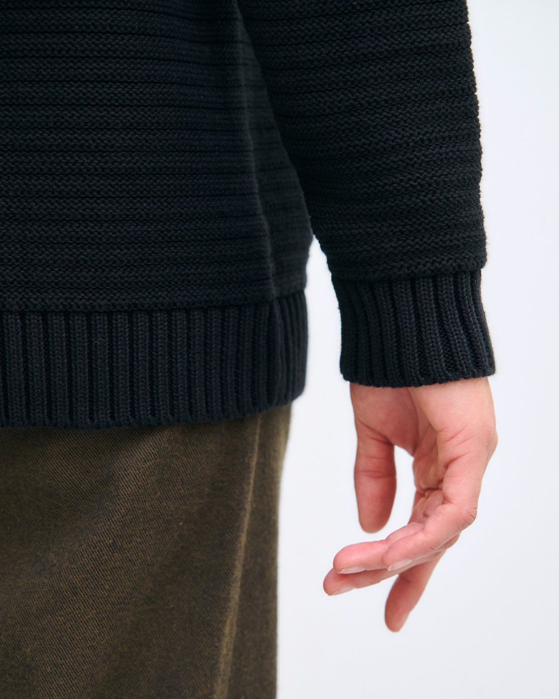 Black ribbed knit sweater made from 100% organic cotton by Rotholz