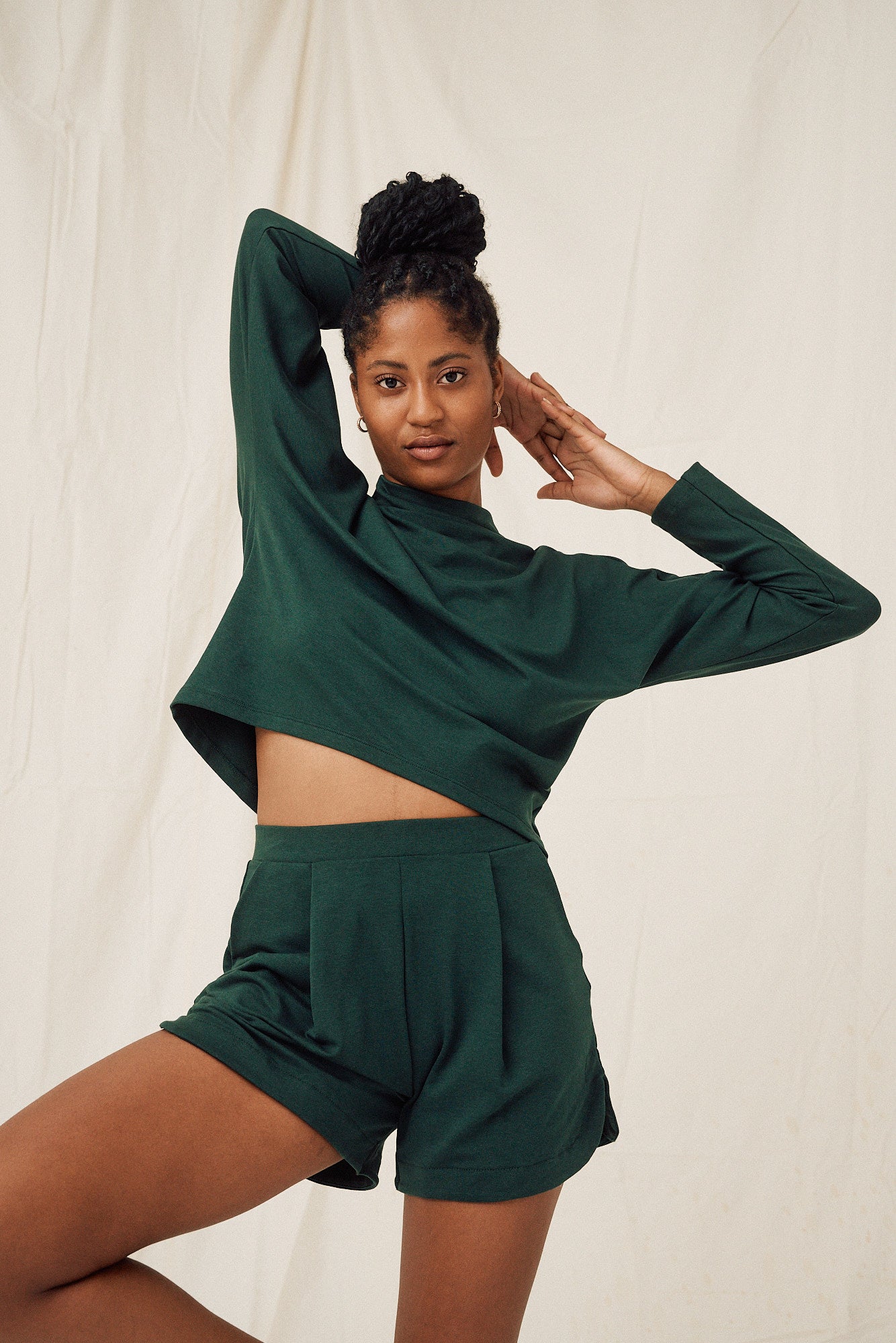 Green formal shorts made of lyocell by MOYA KALA 