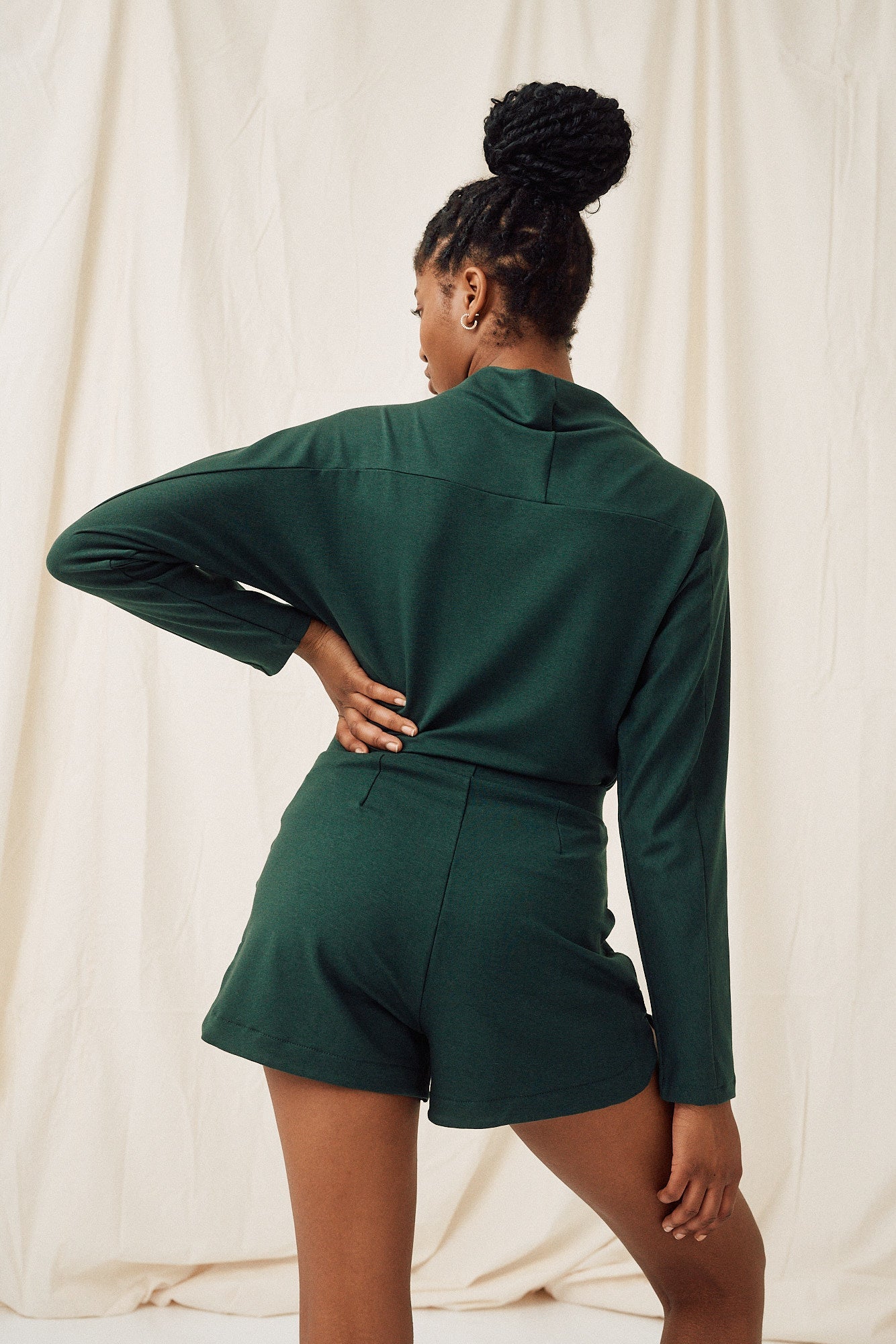 Green formal shorts made of lyocell by MOYA KALA 