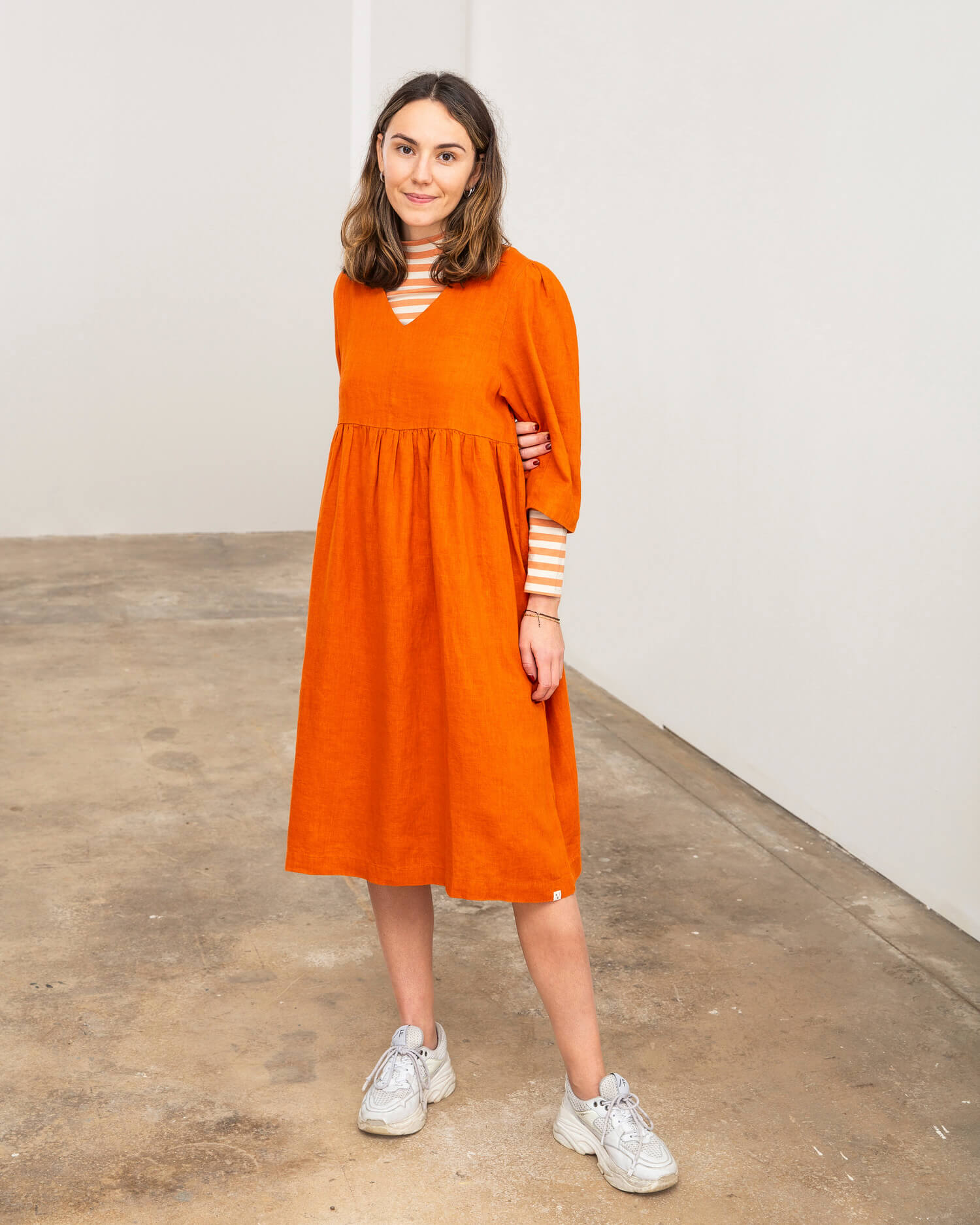 Red V-neck linen dress by Matona