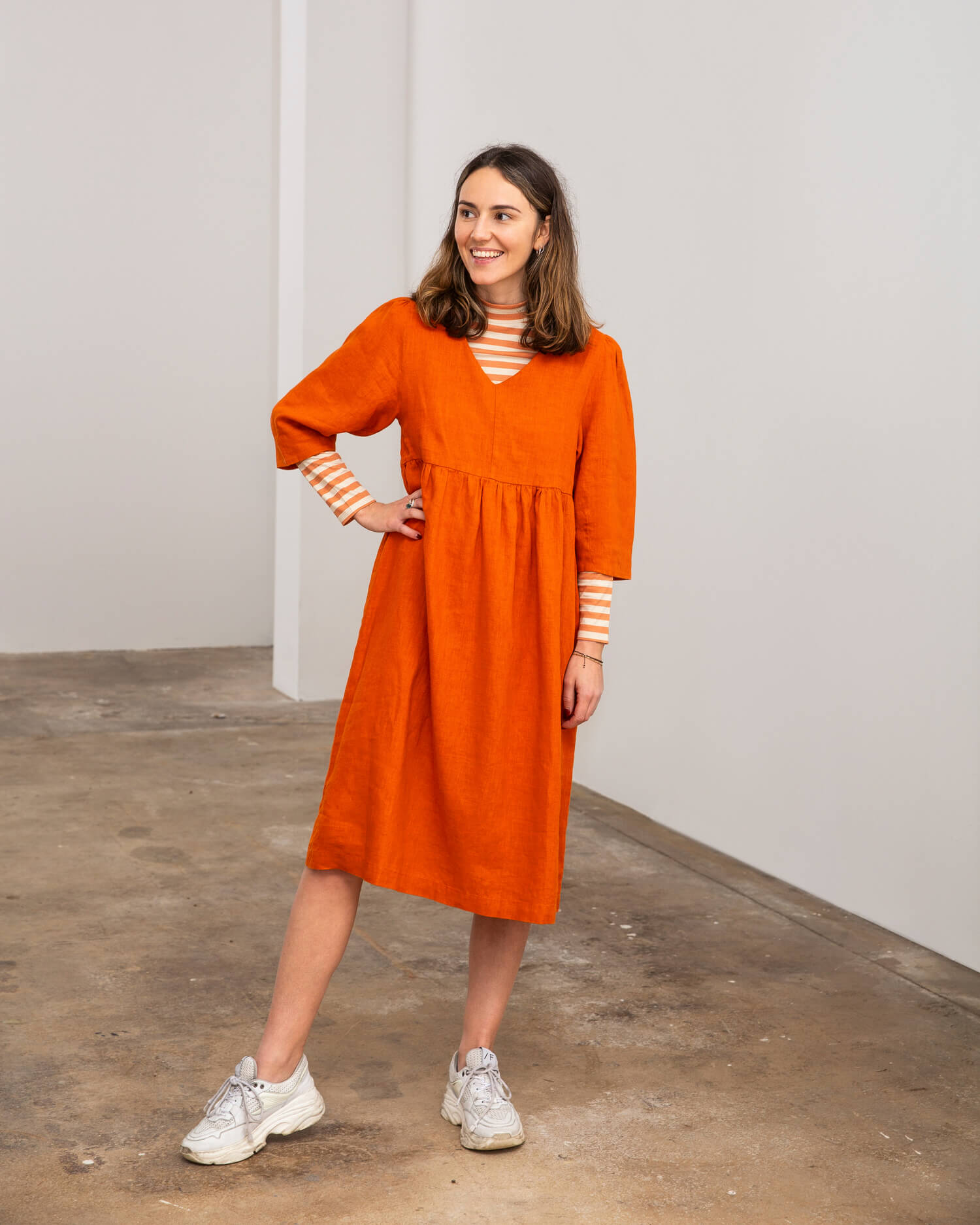 Red V-neck linen dress by Matona