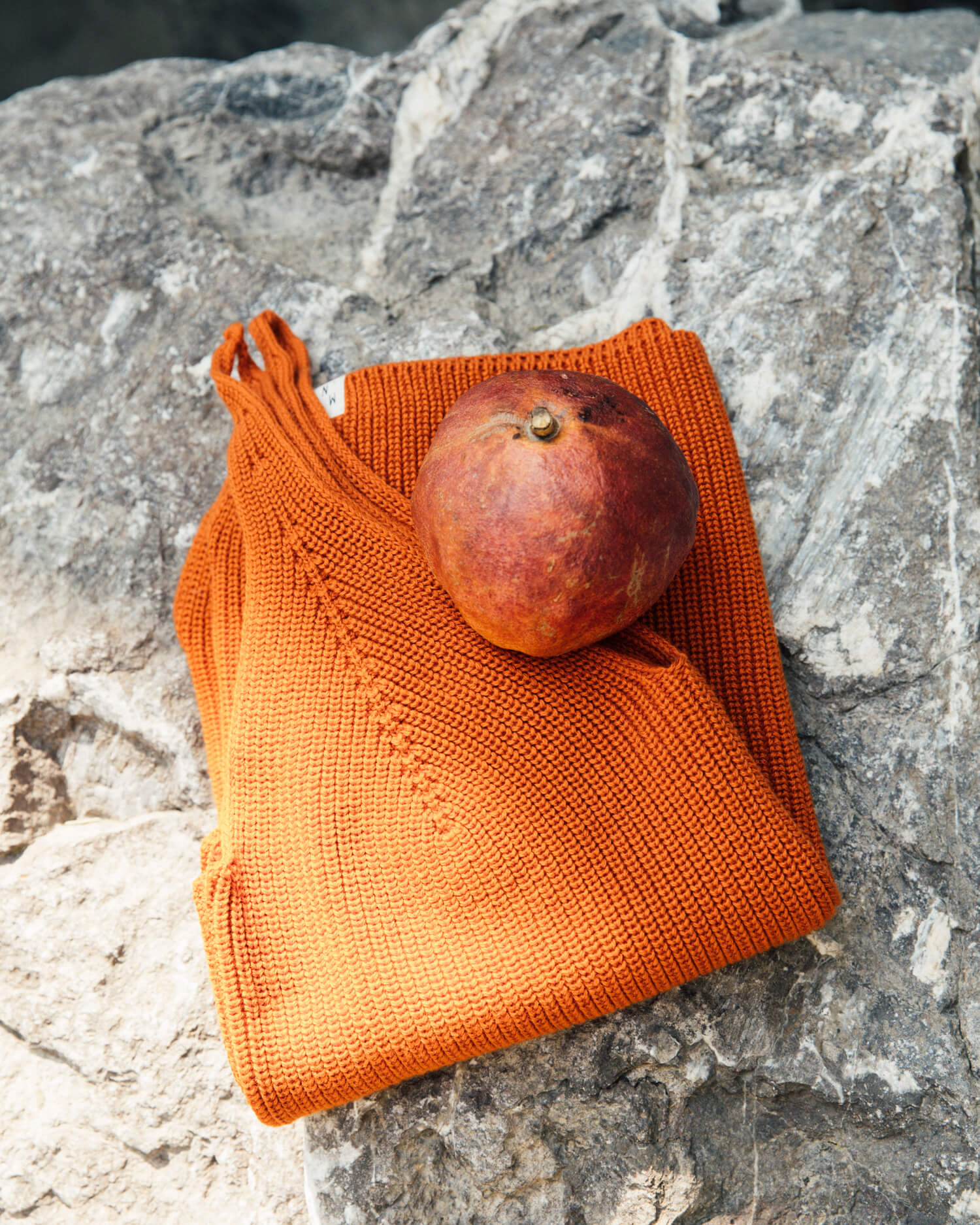 Orange, knitted tank top made from 100% organic cotton by Matona