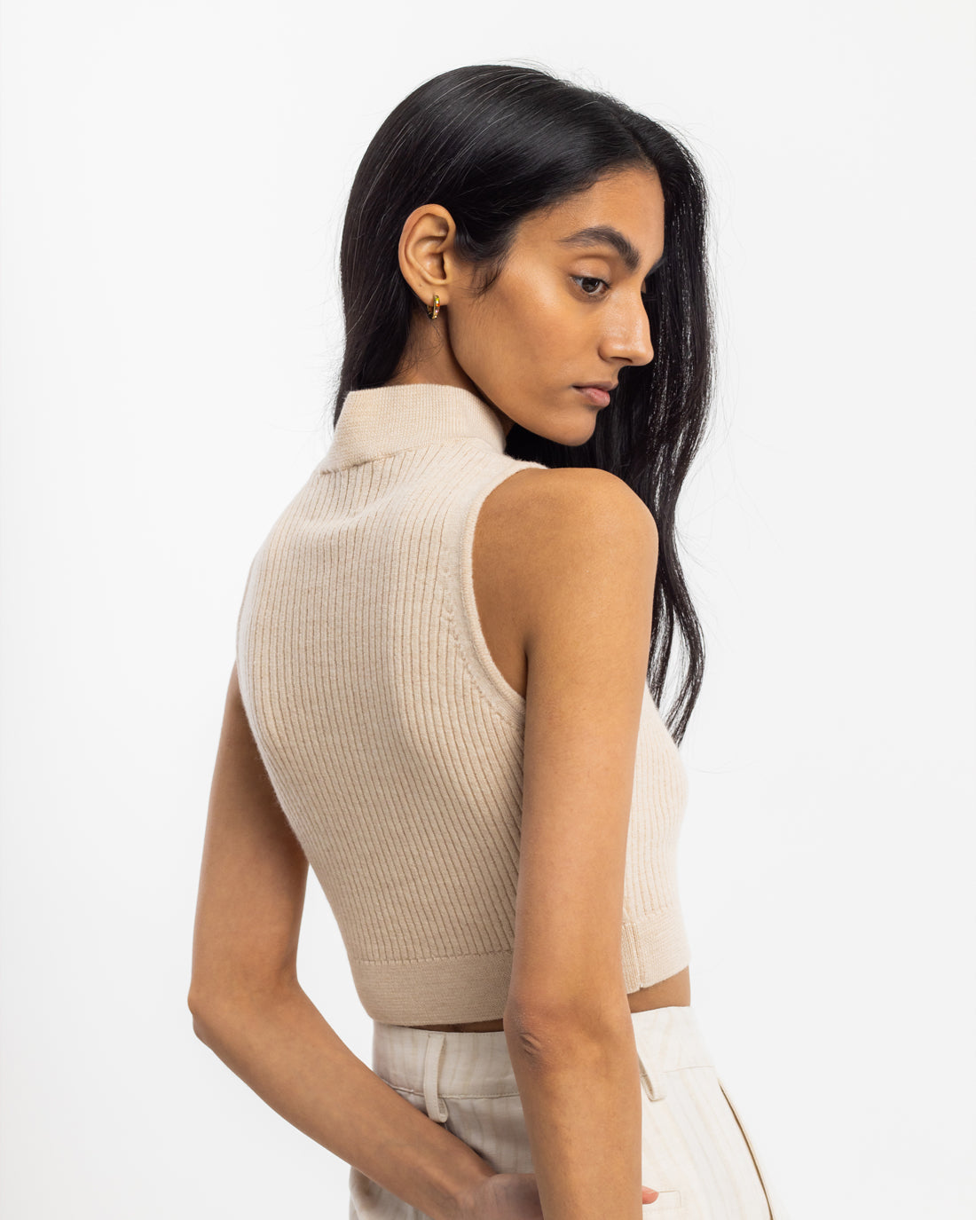 Sand-colored knit top made of 100% merino wool by Rotholz