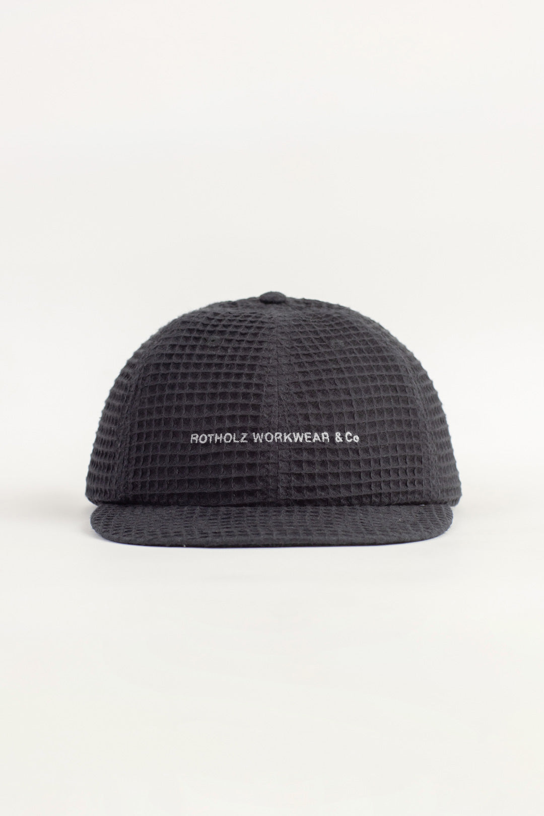 Black waffle cap made from 100% organic cotton by Rotholz