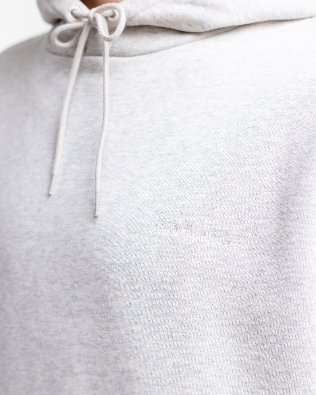 Light gray hoodie logo made of 100% organic cotton from Rotholz