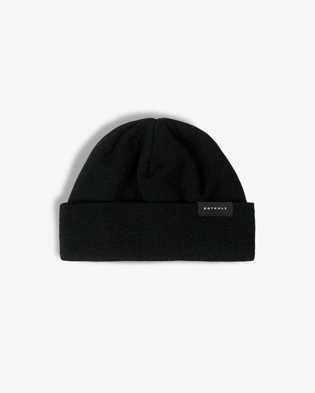 Black short hat made of 100% organic merino wool by Rotholz