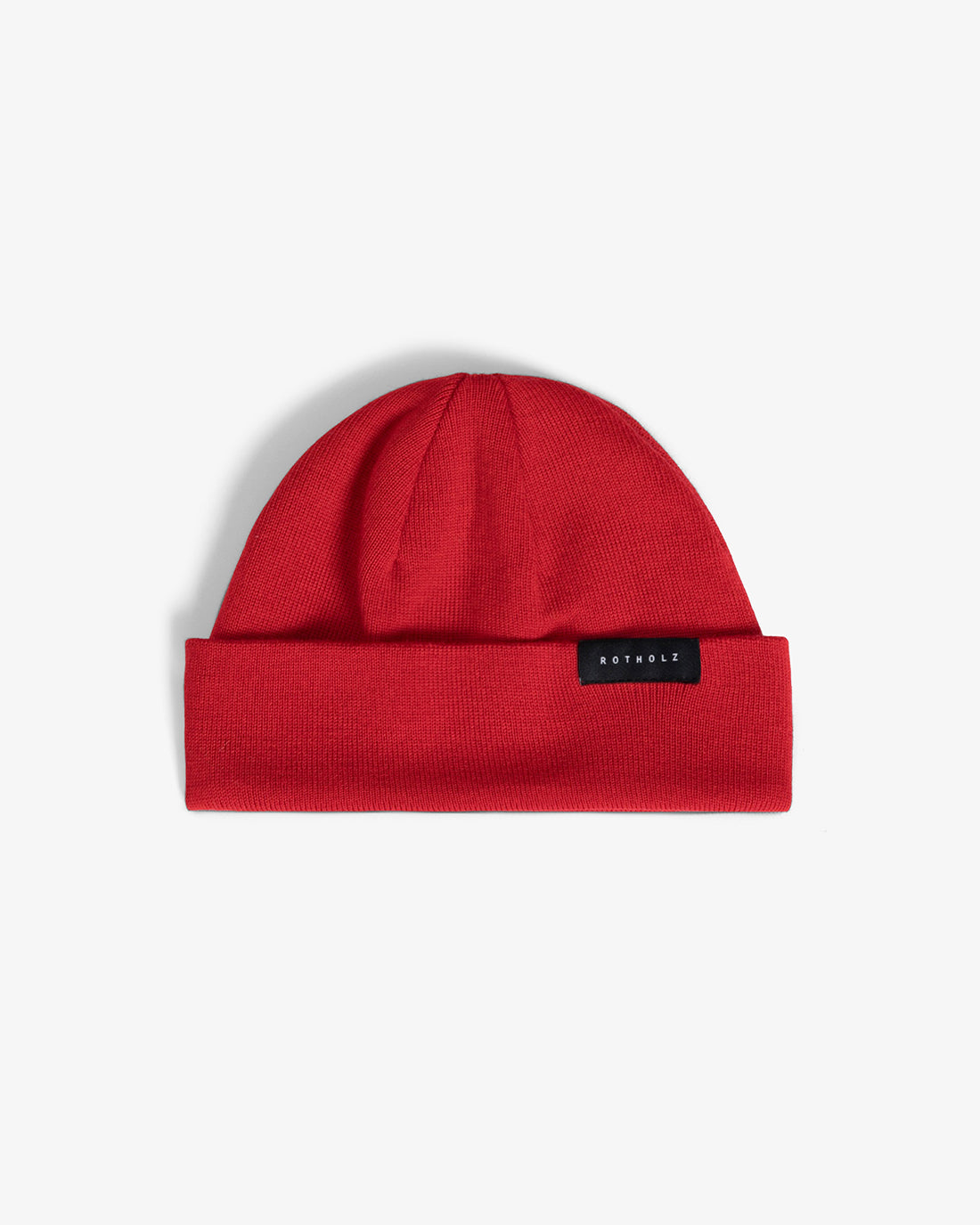 Red short hat made of 100% organic merino wool by Rotholz