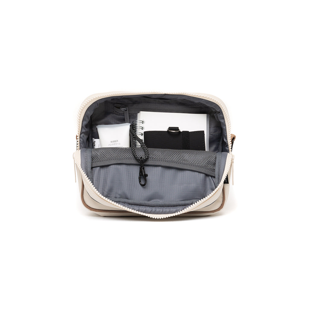 Beige corssbody bag Tokay Tech (2.5l) made from recycled PET plastic bottles