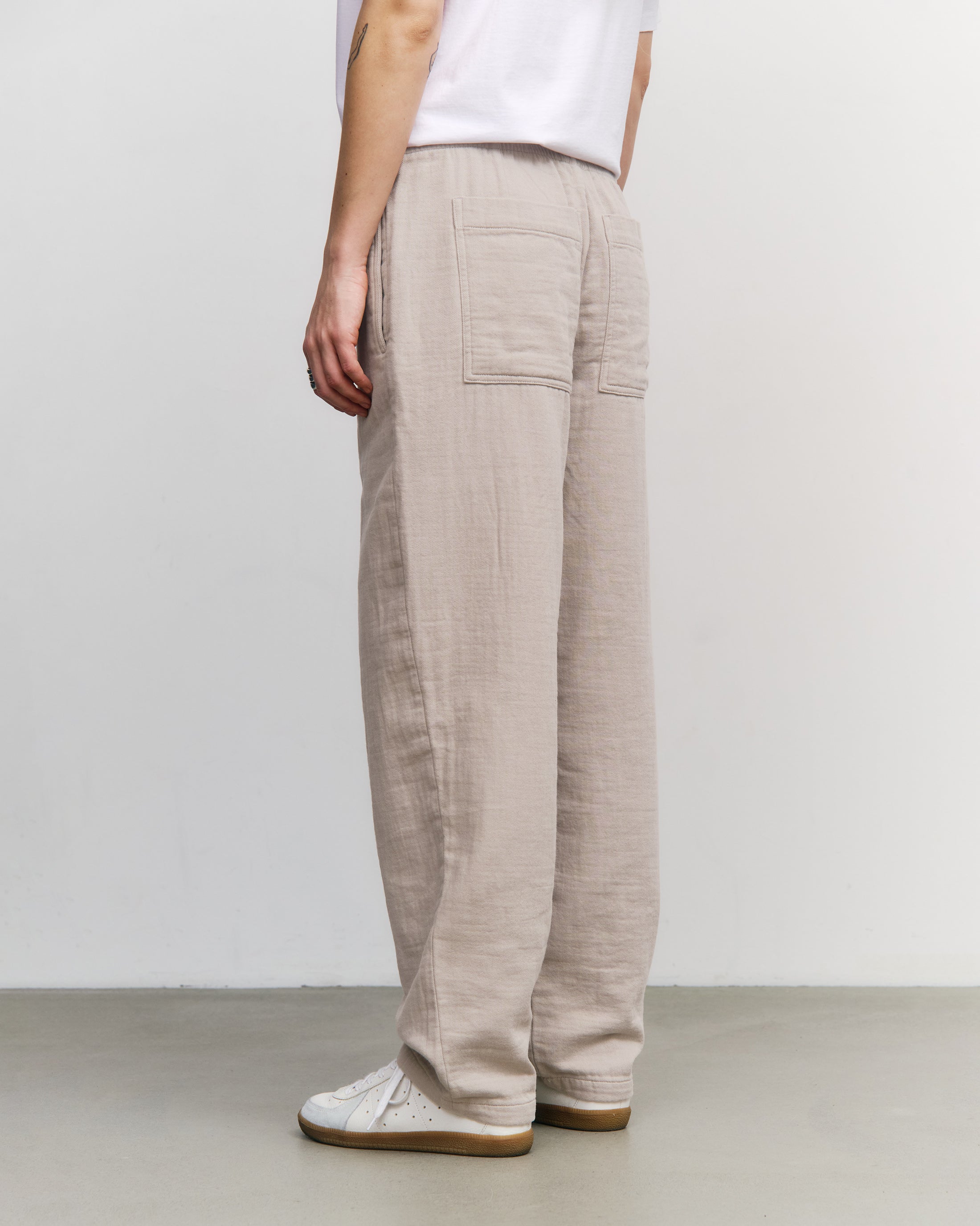 Beige wide trousers made from 100% organic cotton by Rotholz