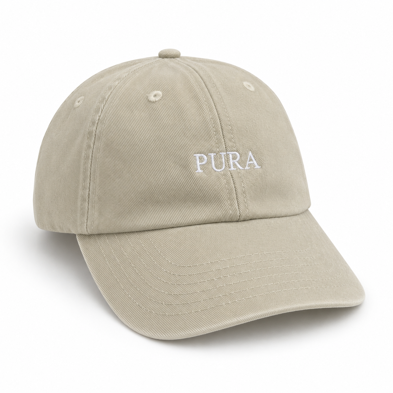 A light beige cotton baseball cap with 'PURA' embroidered in white on the front, shown on a clean white background.