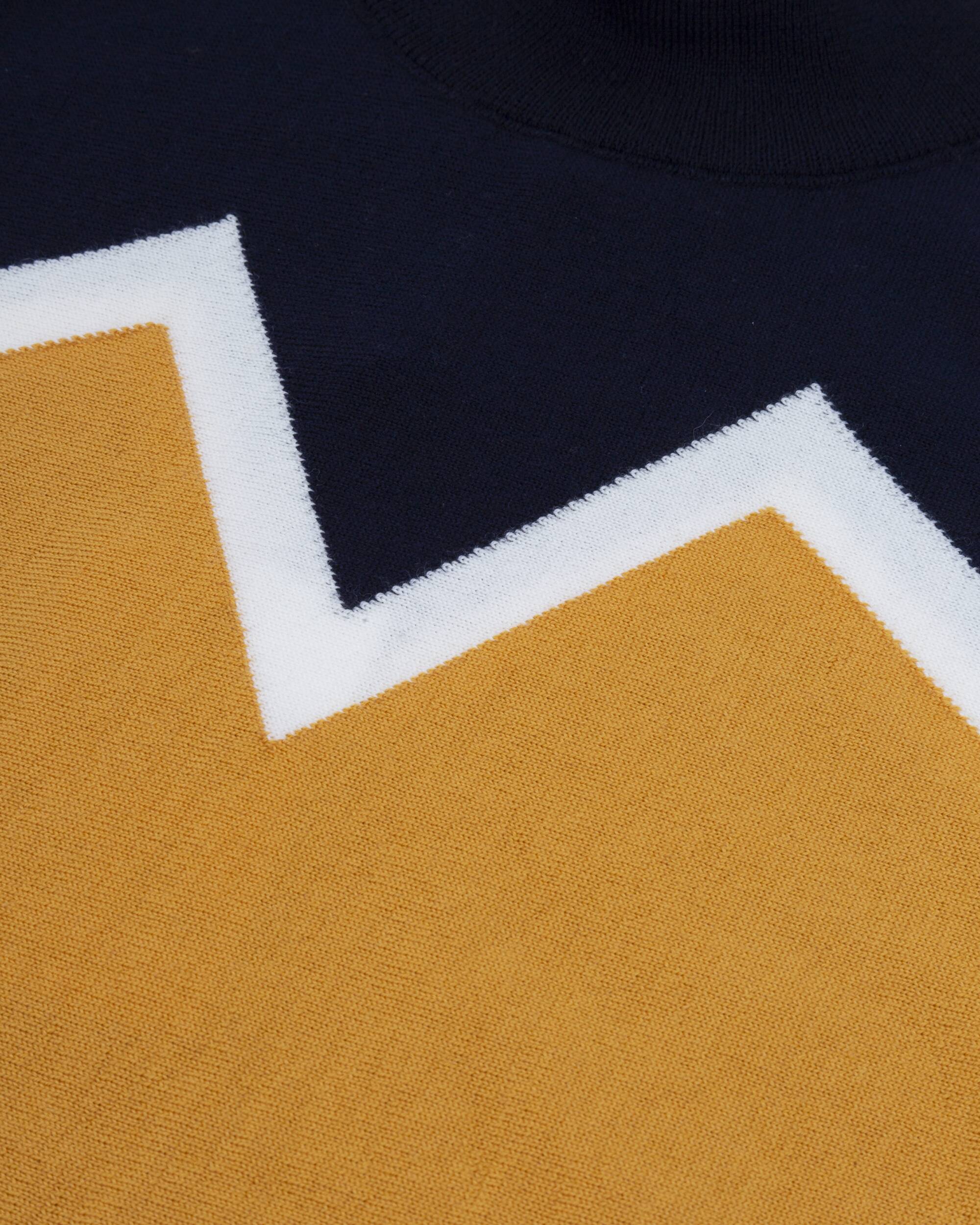 Sweater "Winter Peak Navy Neck" in orange and blue made from 100% organic merino wool from Brava Fabrics