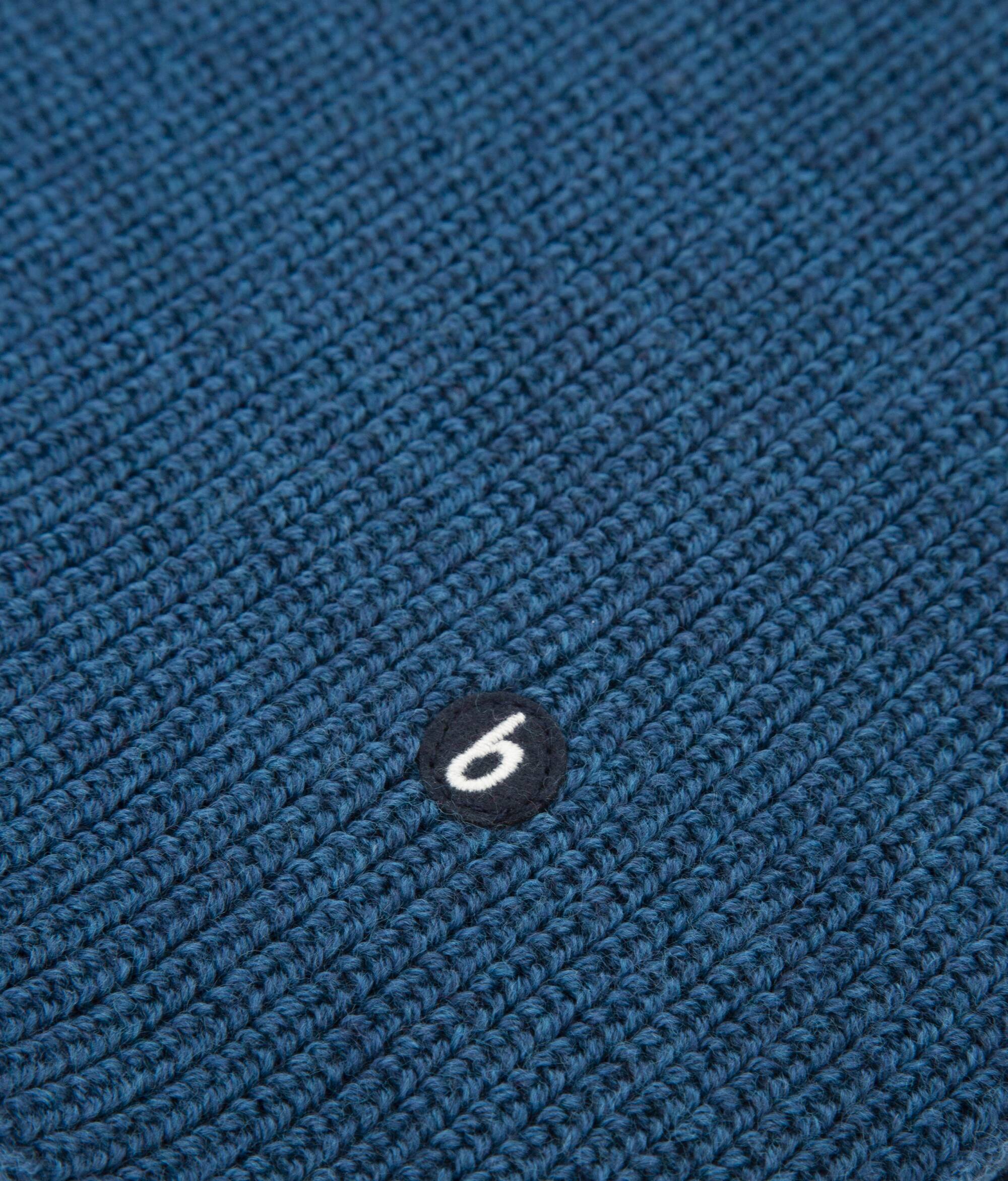 Écharpe "Petrol" en turquoise / bleu - rouge en laine mérinos 100% biologique de Brava Fabrics