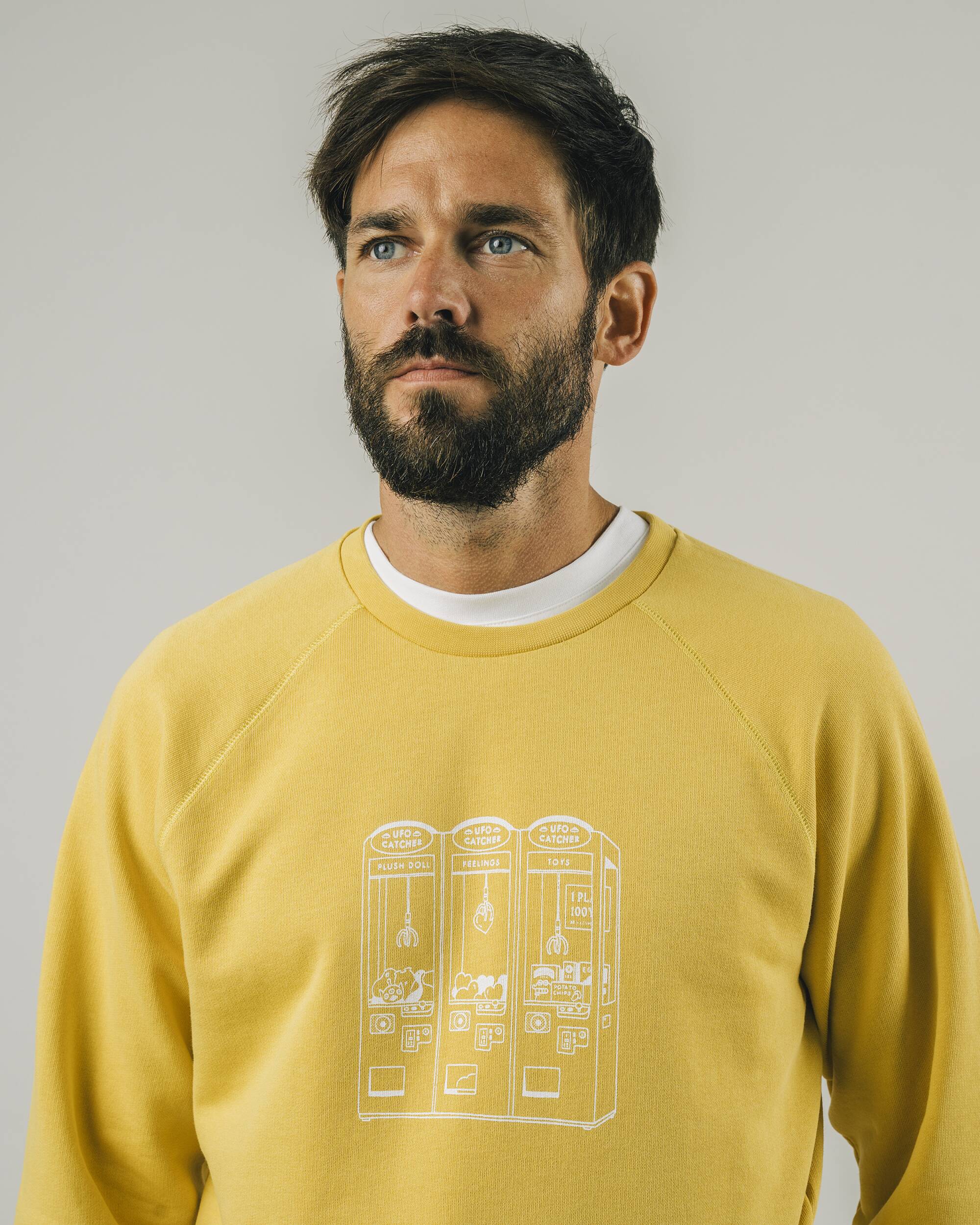Yellow sweater Ufo Catcher made of 100% organic cotton from Brava Fabrics