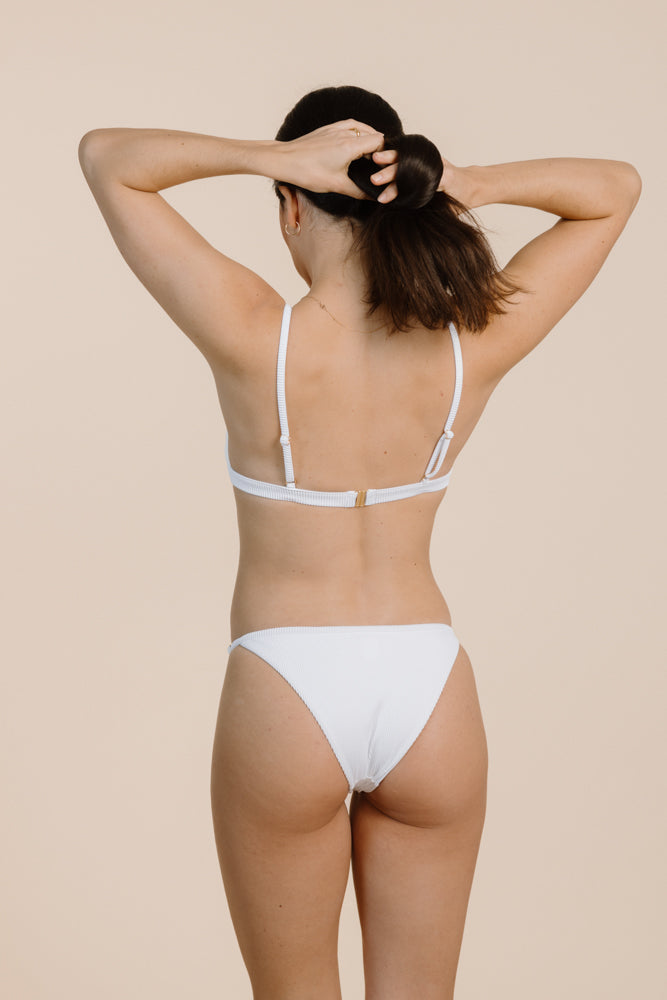White bikini top JOA made from recycled polyamide from PURA Clothing
