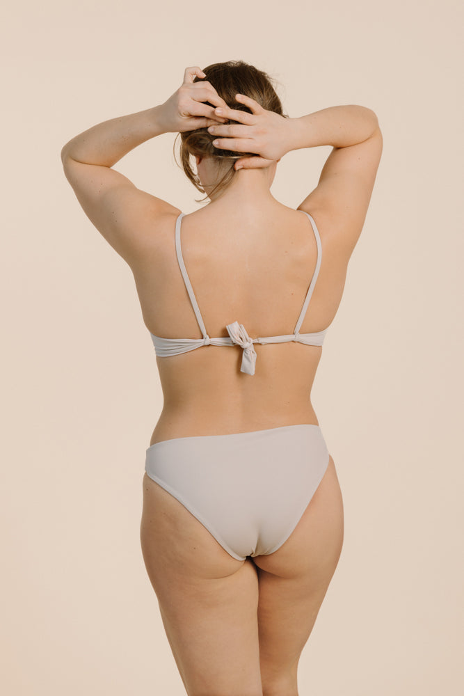 Powder-colored bikini bottom ELLA made from recycled polyamide from Pura Clothing