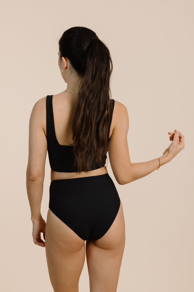 Black bikini bottom CALA made from recycled polyamide from Pura Clothing