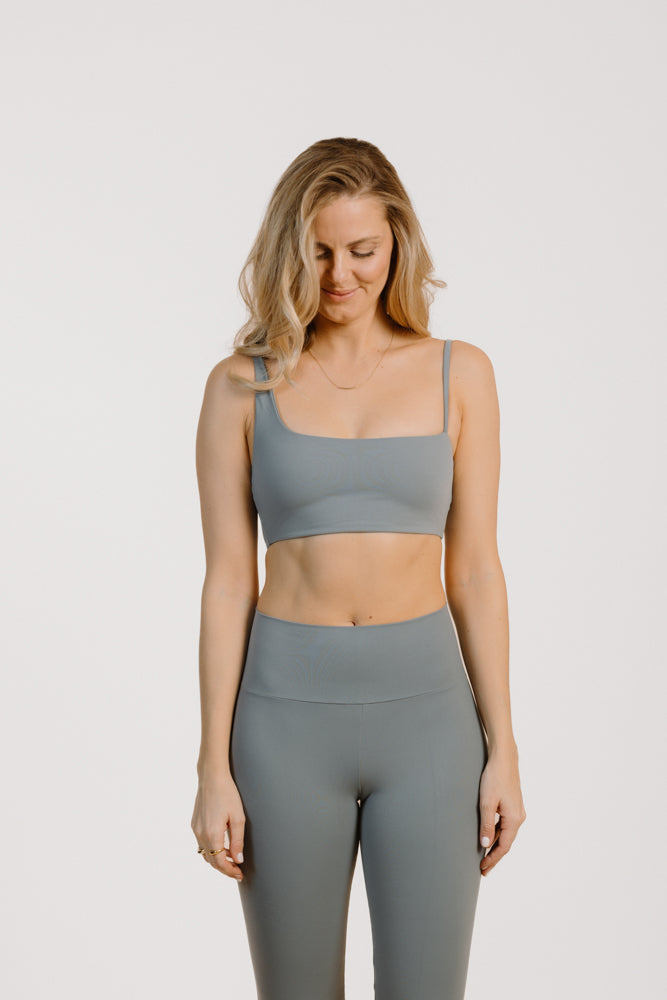 Gray top NADA made from recycled polyamide from PURA Clothing
