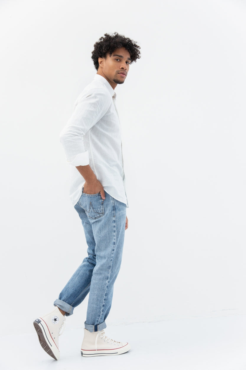 Jim jeans in blue made of organic cotton and recycled denim with orange seams from Kuyichi