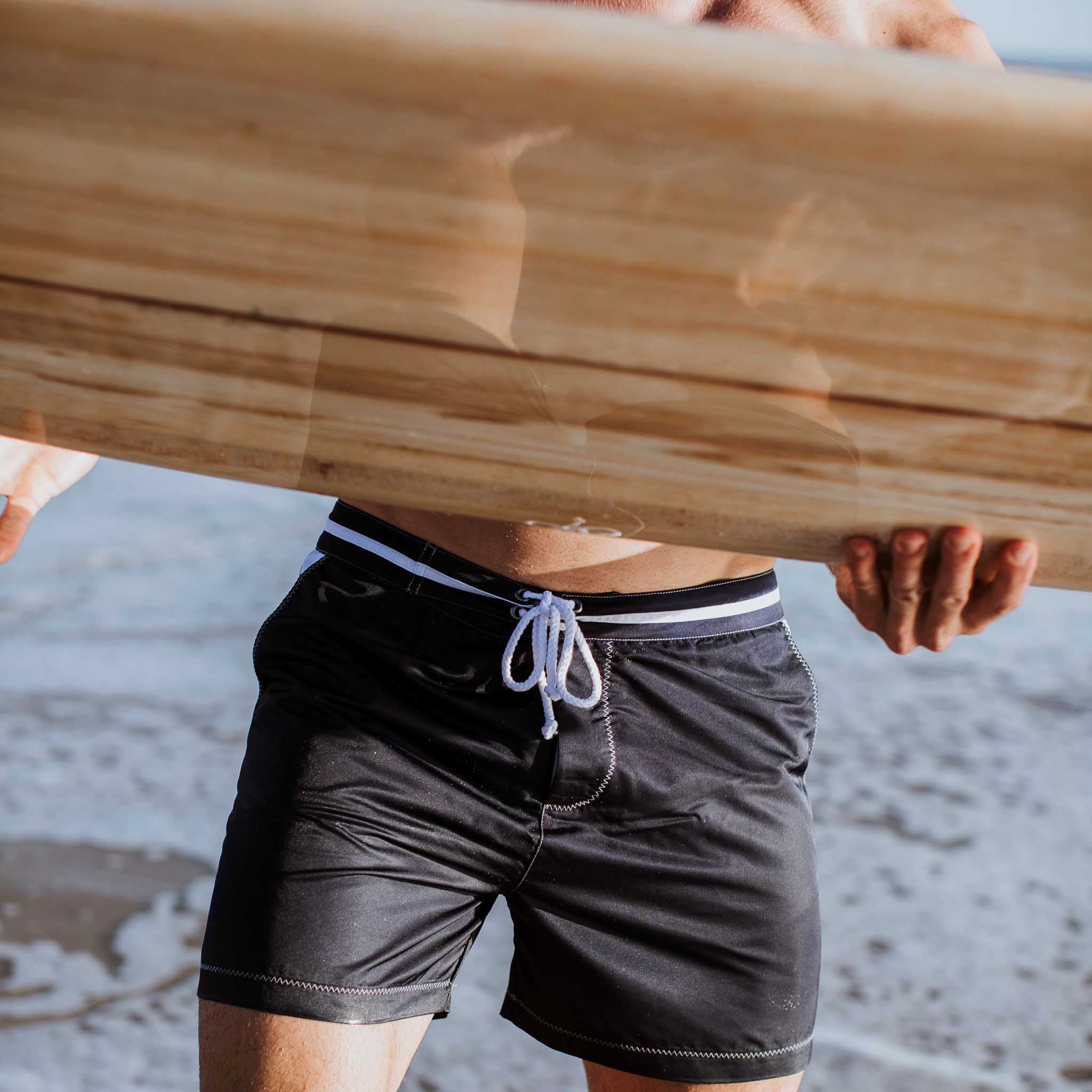Navy blue swimming trunks made from recycled polyester from Bluebuck