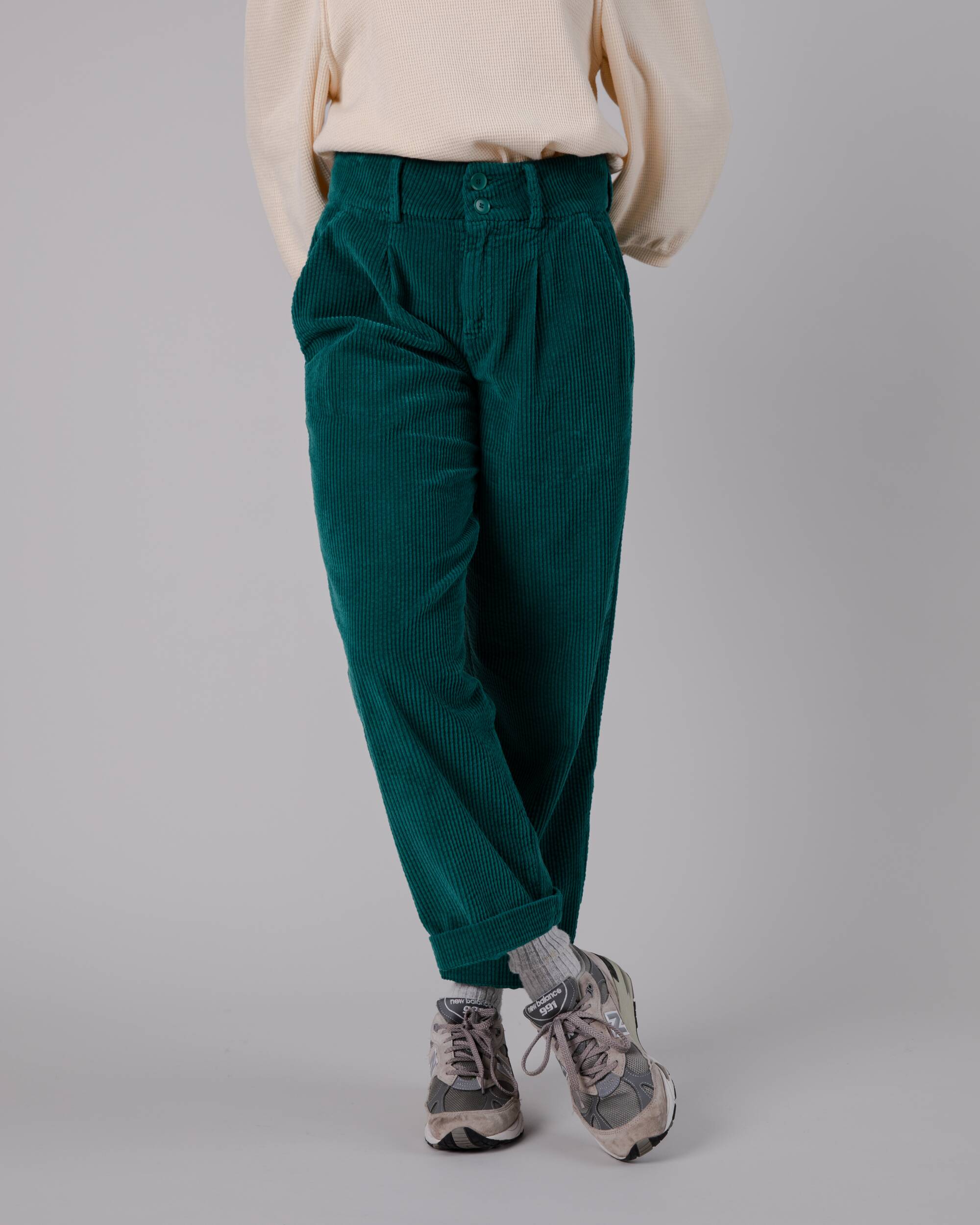 Corduroy pleated trousers in green made from organic cotton by Brava Fabrics