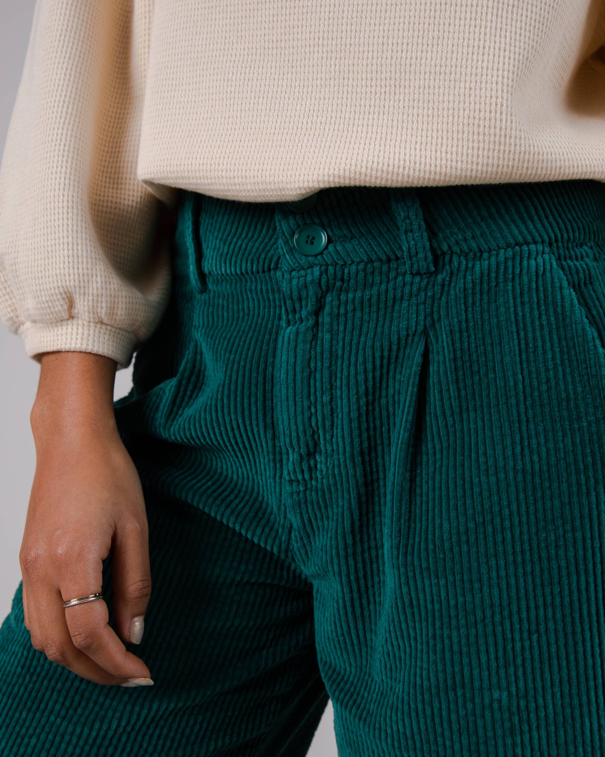 Corduroy pleated trousers in green made from organic cotton by Brava Fabrics