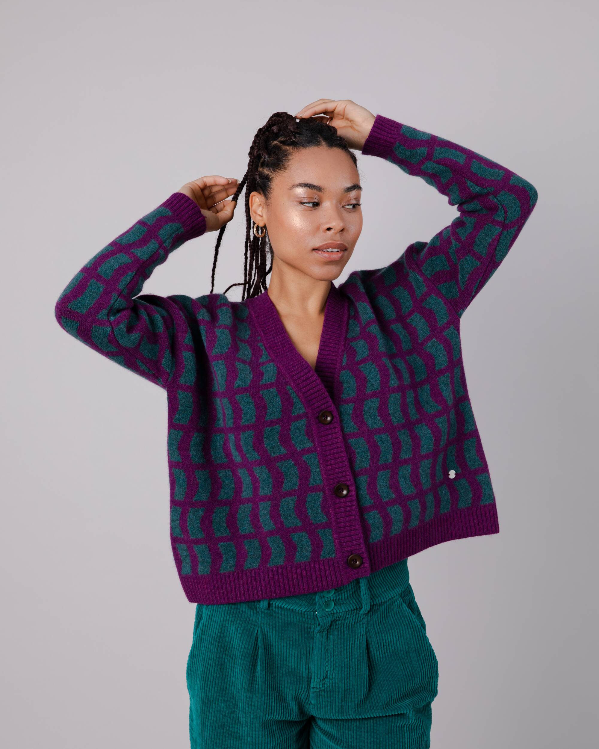 Mulberry colored geo wool cardigan made from recycled materials from Brava Fabrics