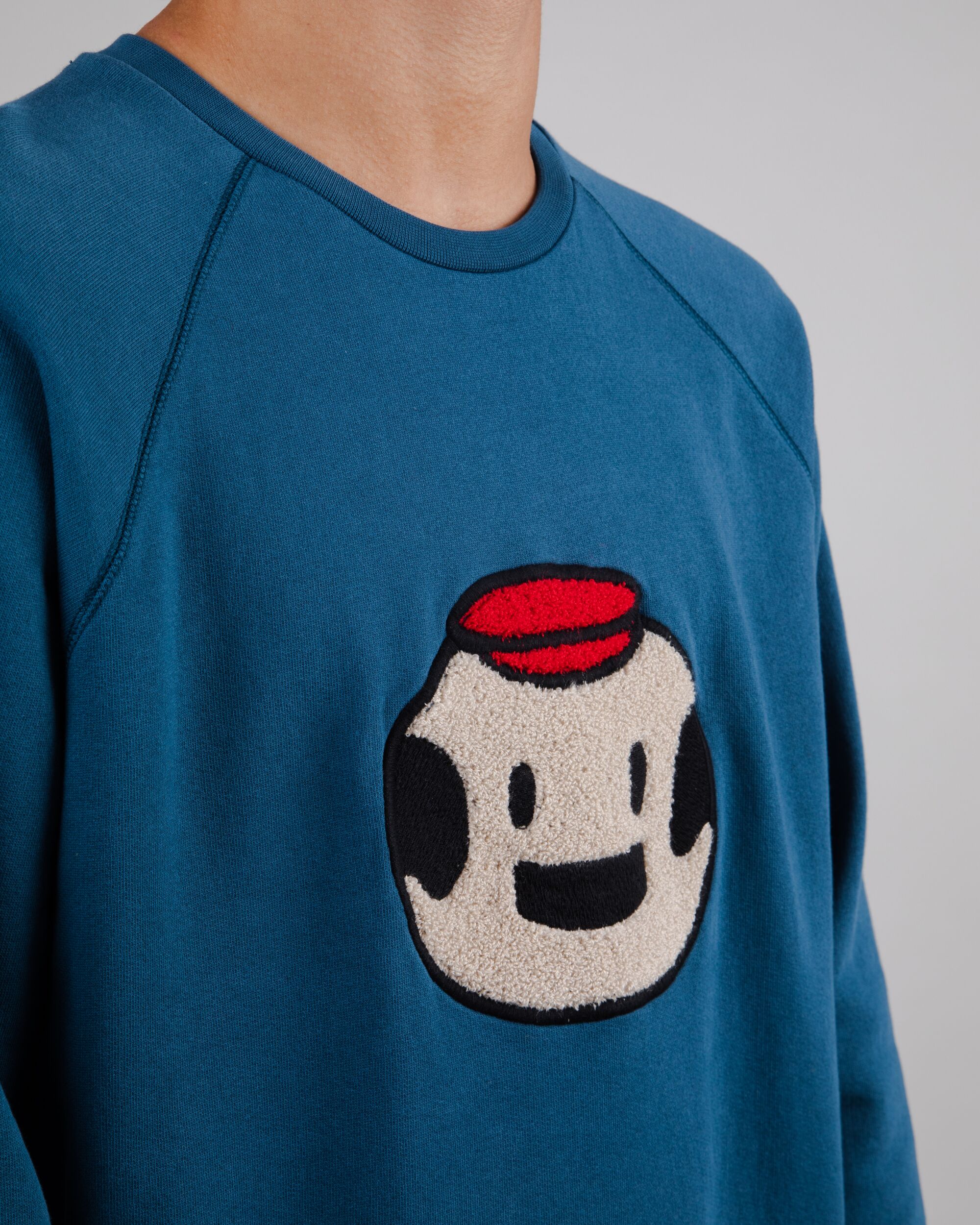 Blue organic cotton Dickie Logo sweater from Brava Fabrics