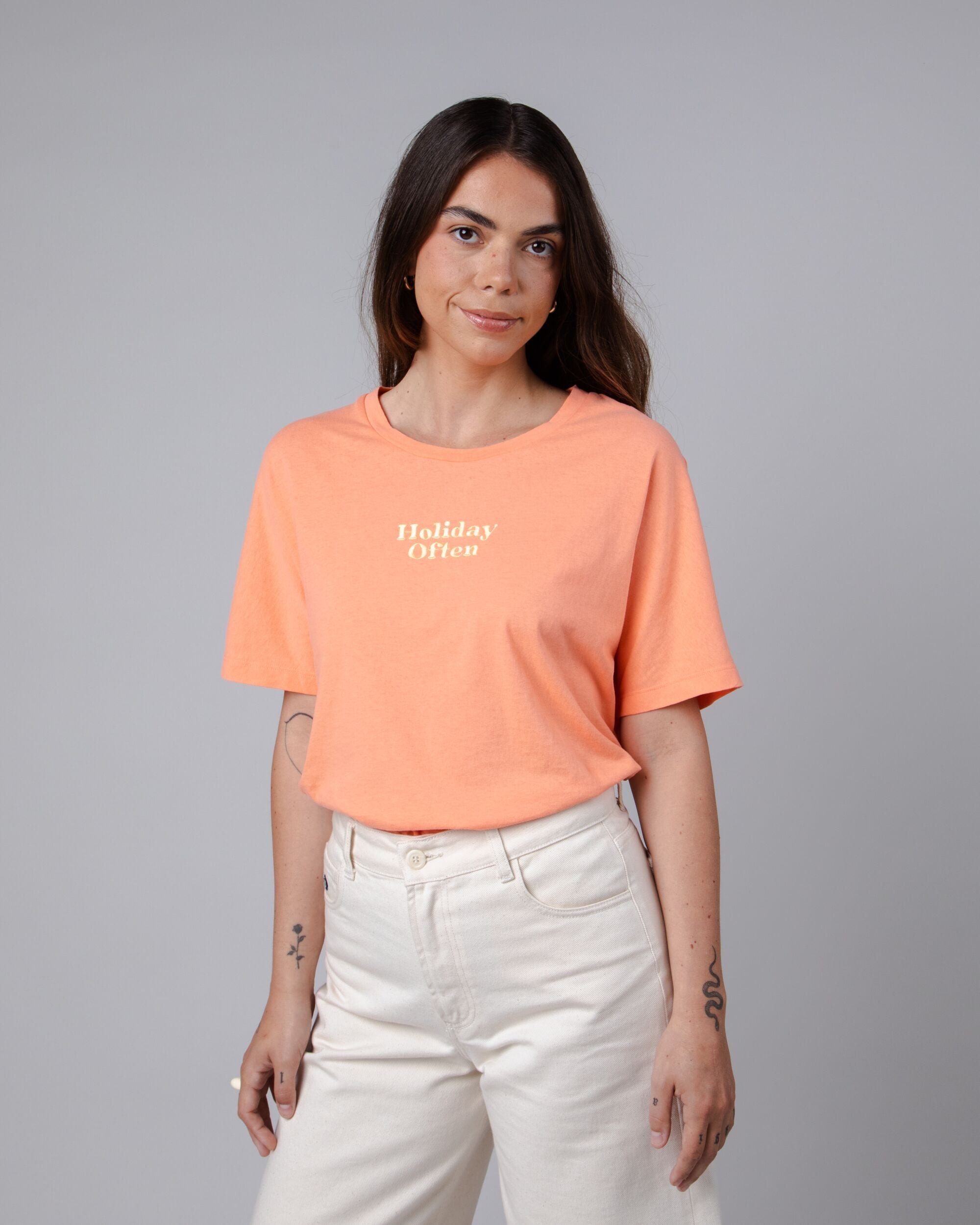 Oversize T-shirt Holidays in Coral made from organic cotton by Brava Fabrics