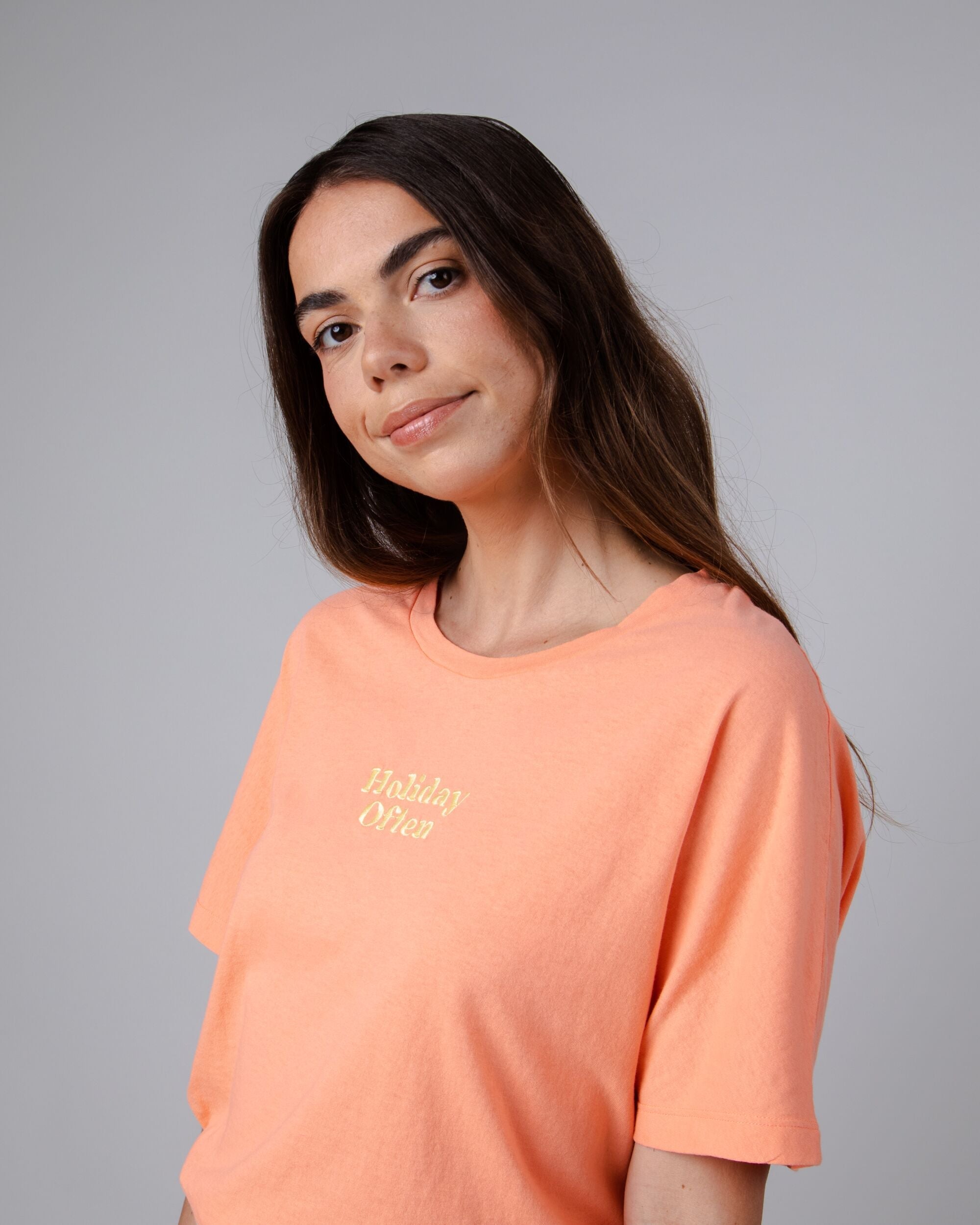 Oversize T-shirt Holidays in Coral made from organic cotton by Brava Fabrics