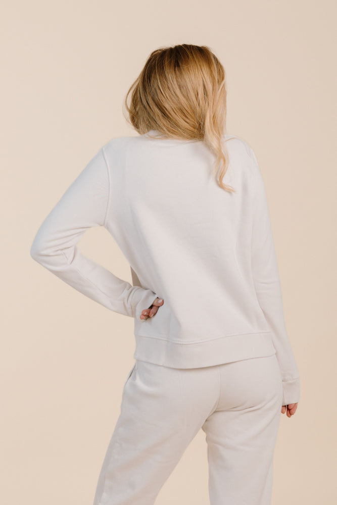 White sweater CALMA made from 100% organic cotton from Pura Clothing