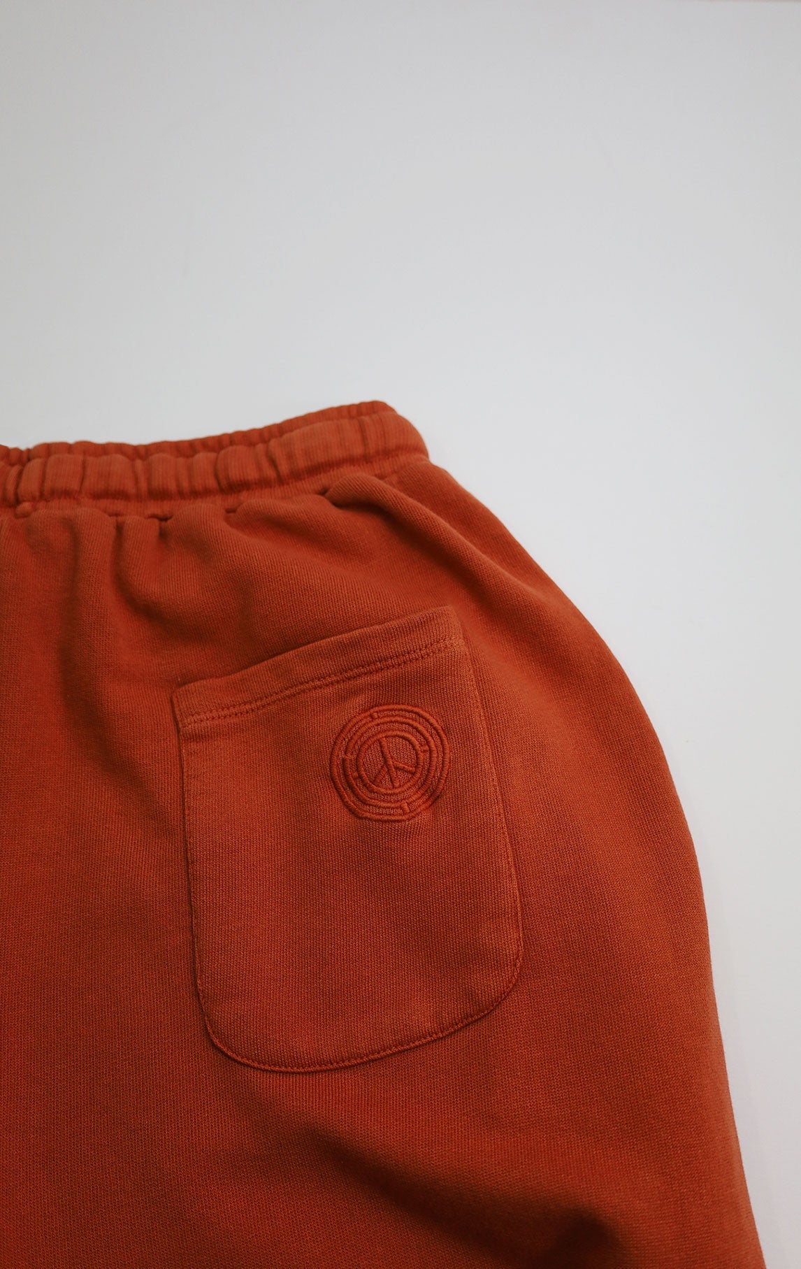 Dark orange EVIE jogging pants made of organic cotton from Komodo