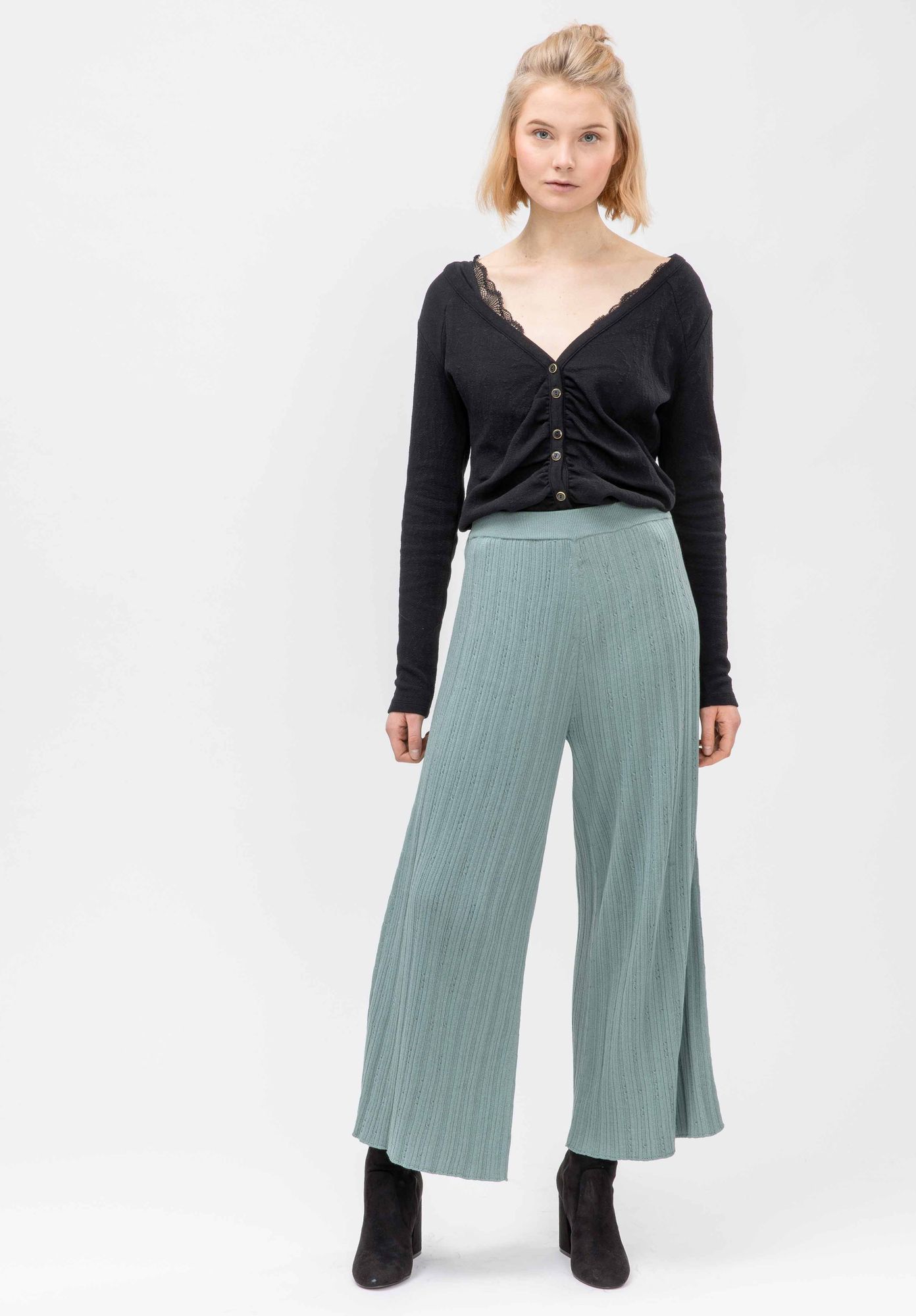 LATHI trousers in culotte shape in antique green by LOVJOI made from organic cotton